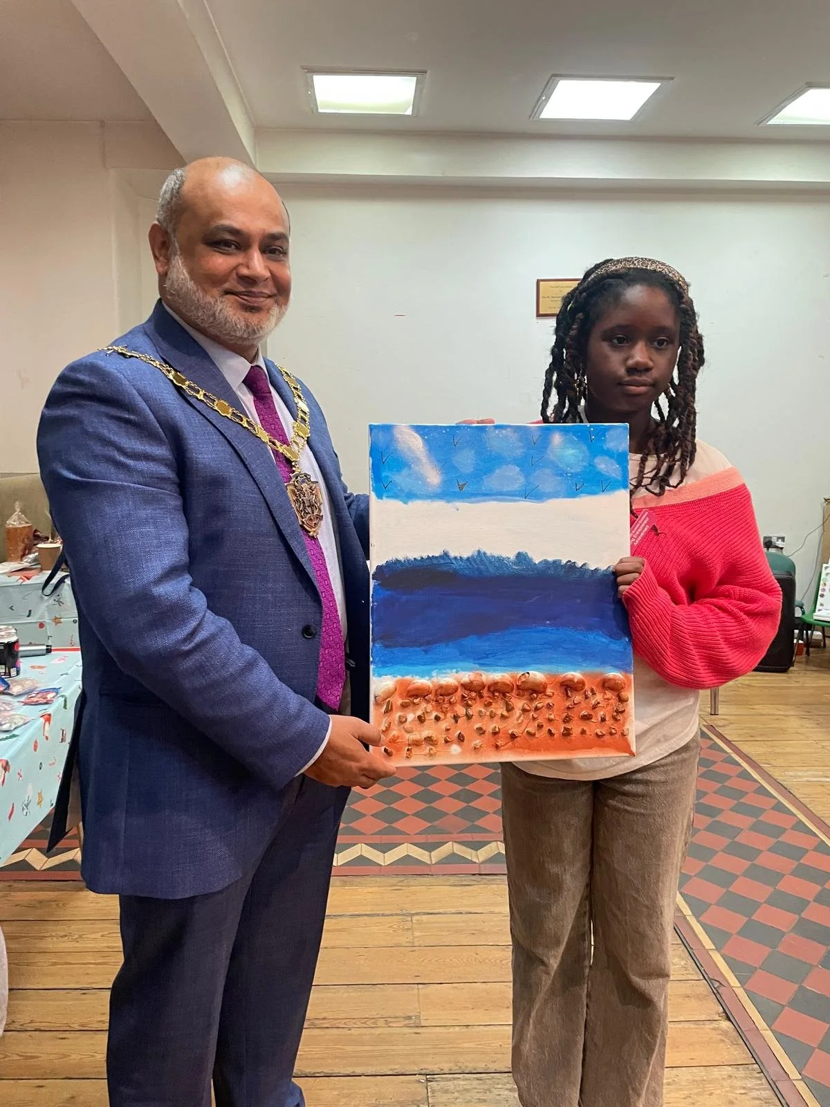 TVI Founder: Presenting Her art piece to Croydon Deputy Civic Mayor: Councillor Mohammed Islam
