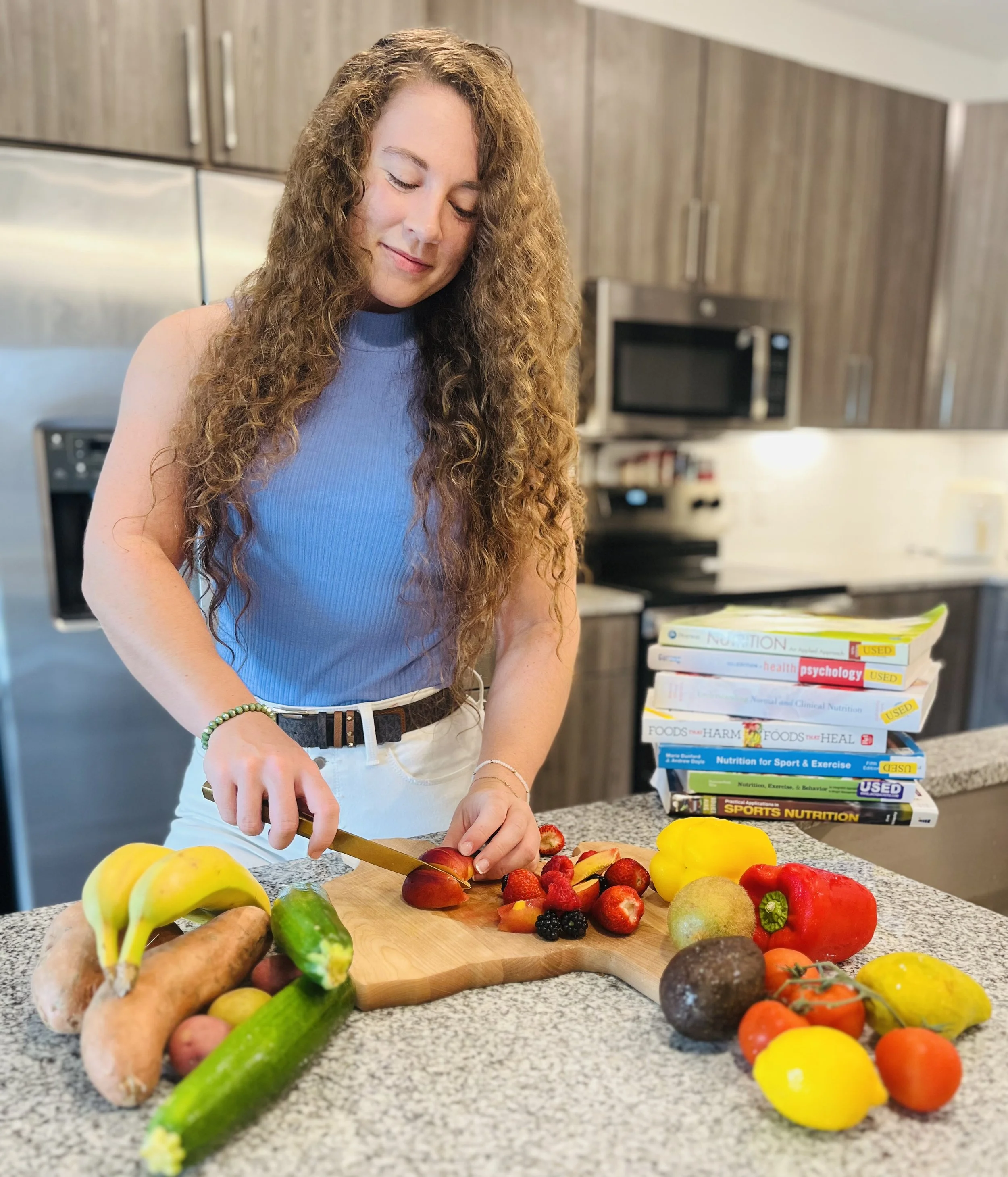 Nutritionist Smiling Chopping Fruit