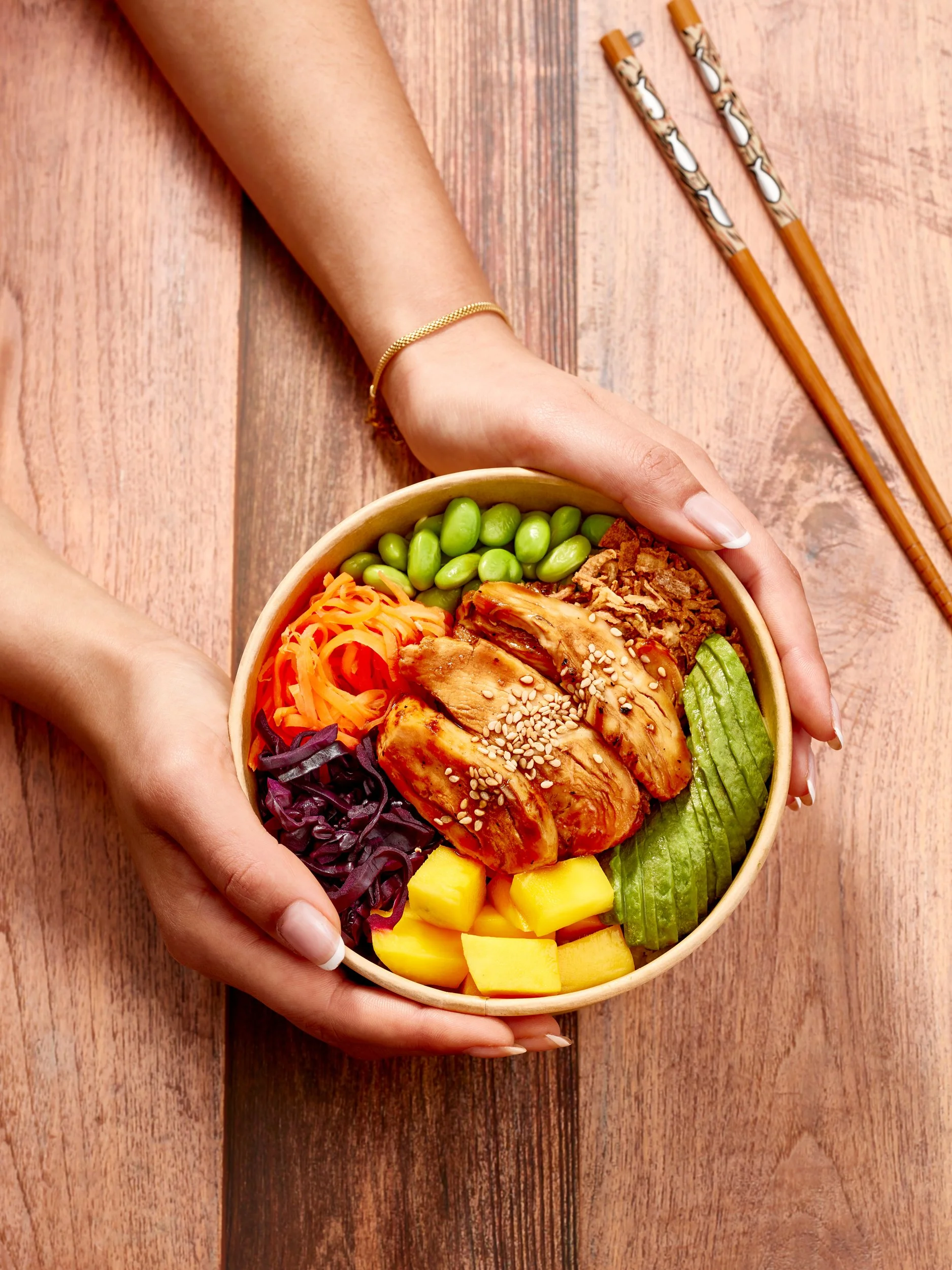 Edward Fury Food Photographer Sushi Daily Hands hugging bowl.jpg