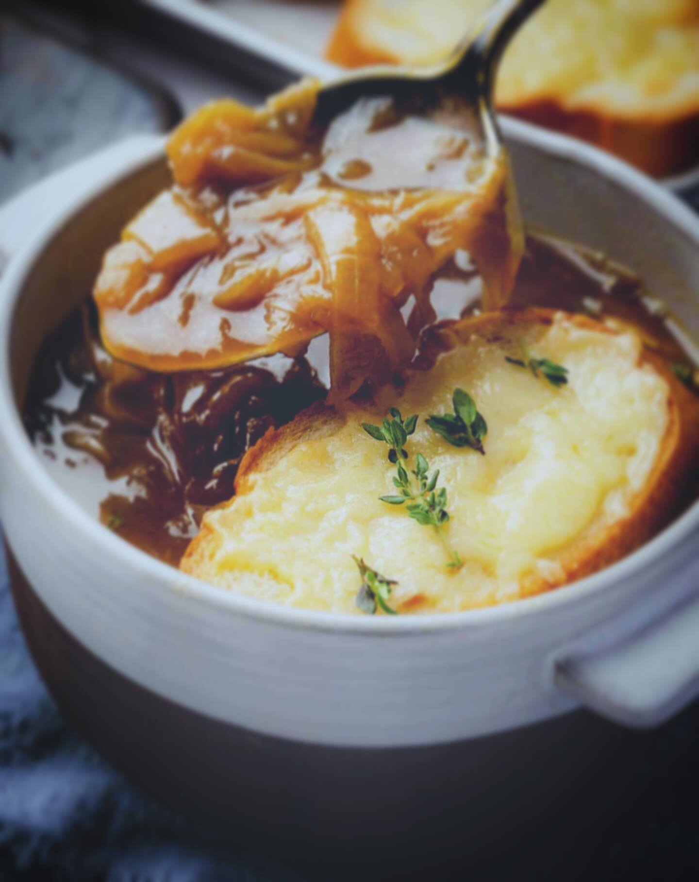 Something new is coming ! ☝️☝️ Indulge in the irresistible warmth of our French onion soup, where the sweet caramelised onions mingle with savoury broth - perfect for cozying up and savouring a taste of France in every spoonful . Available from next 