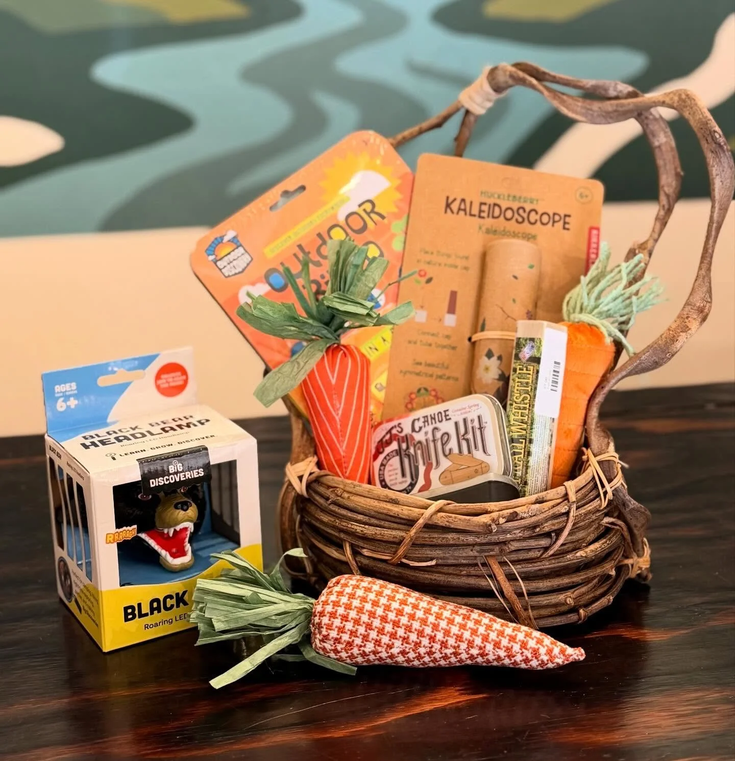 We know&hellip; it&rsquo;s early 😄
But every year Easter sneaks up on everyone so we quietly started a basket shelf.

Little things for spring adventures, road trips and rainy day exploring &mdash; stickers, books, cozy socks, small toys and a few t