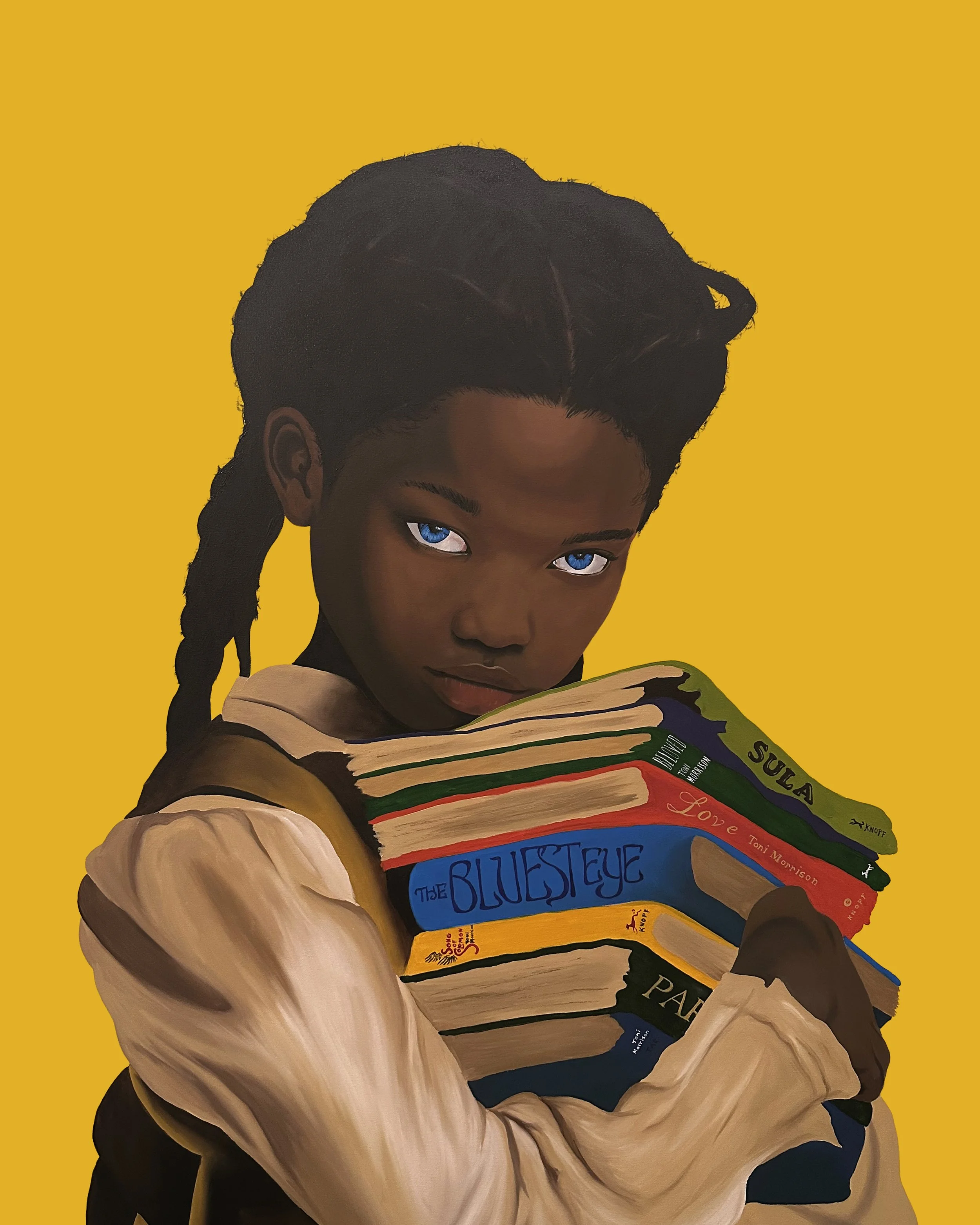 A person with short dark hair and striking blue eyes is holding a stack of colorful books against a yellow background. The person's face and arm are visible, and the books include titles such as The Bluest Eye and Love Toni Morrison.