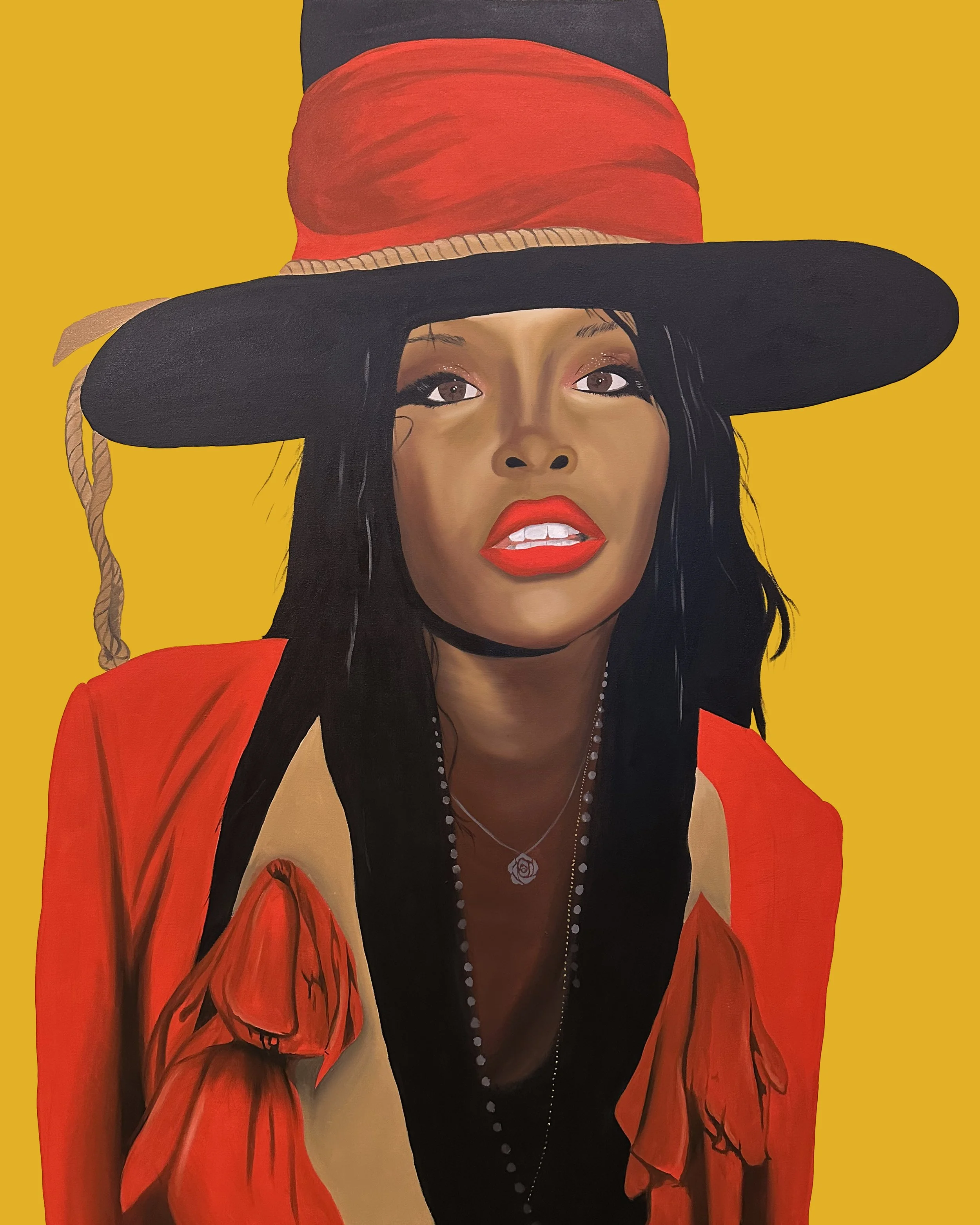 A woman with black hair, red lipstick, and a necklace wearing a red jacket and large black hat with a beige band, looking up against a yellow background.