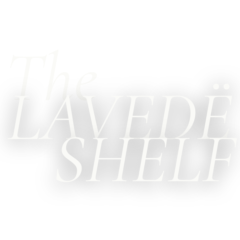 Black background with distorted white text reading "The Lavender Shelf".