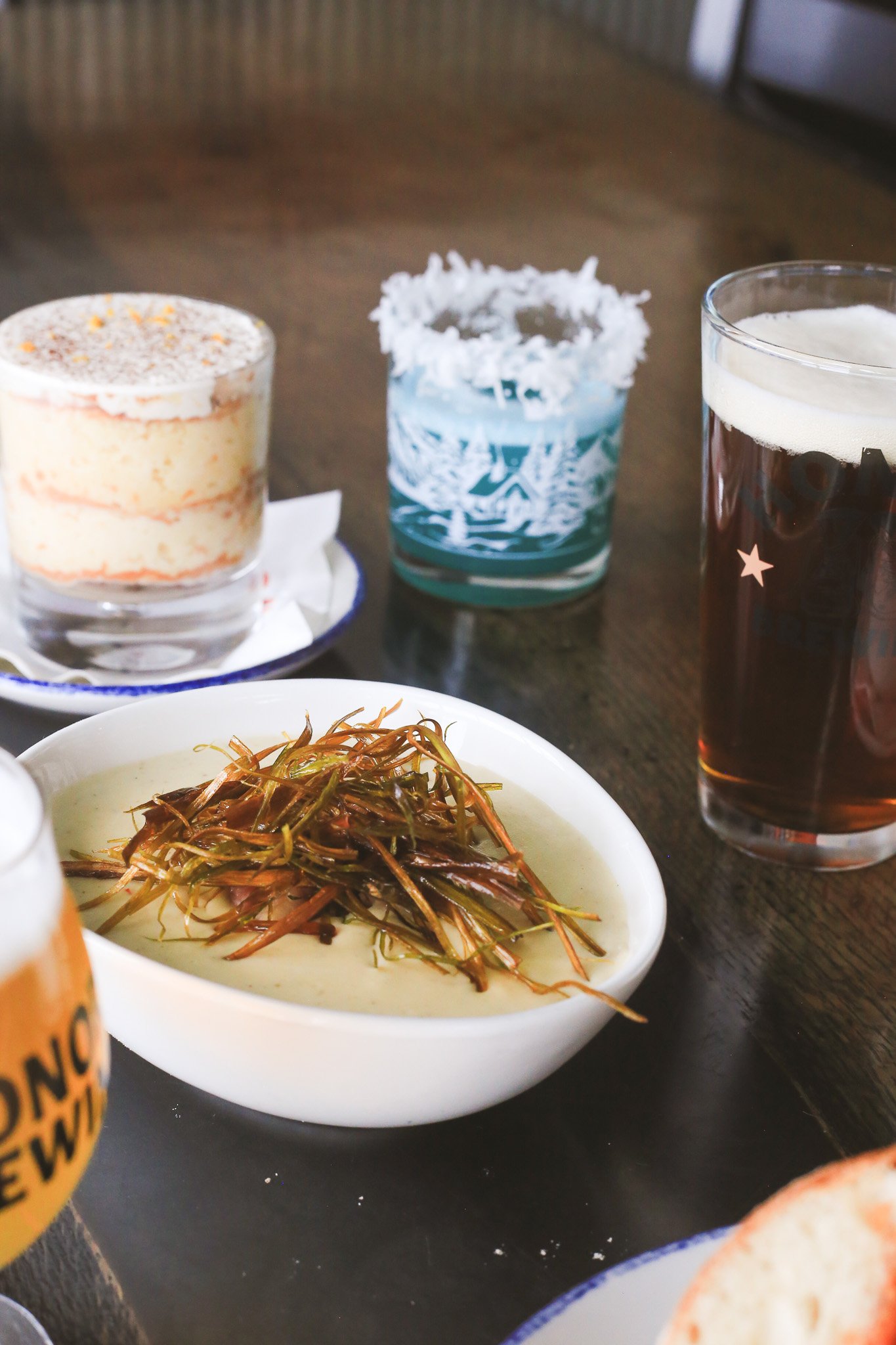 It&rsquo;s cold outside&hellip; which means it&rsquo;s officially soup weather.
Warm up with our creamy Potato Leek Soup topped with crispy fried leeks and chive oil &mdash; and pair it with one of our Holiday Popup cocktails for the perfect seasonal