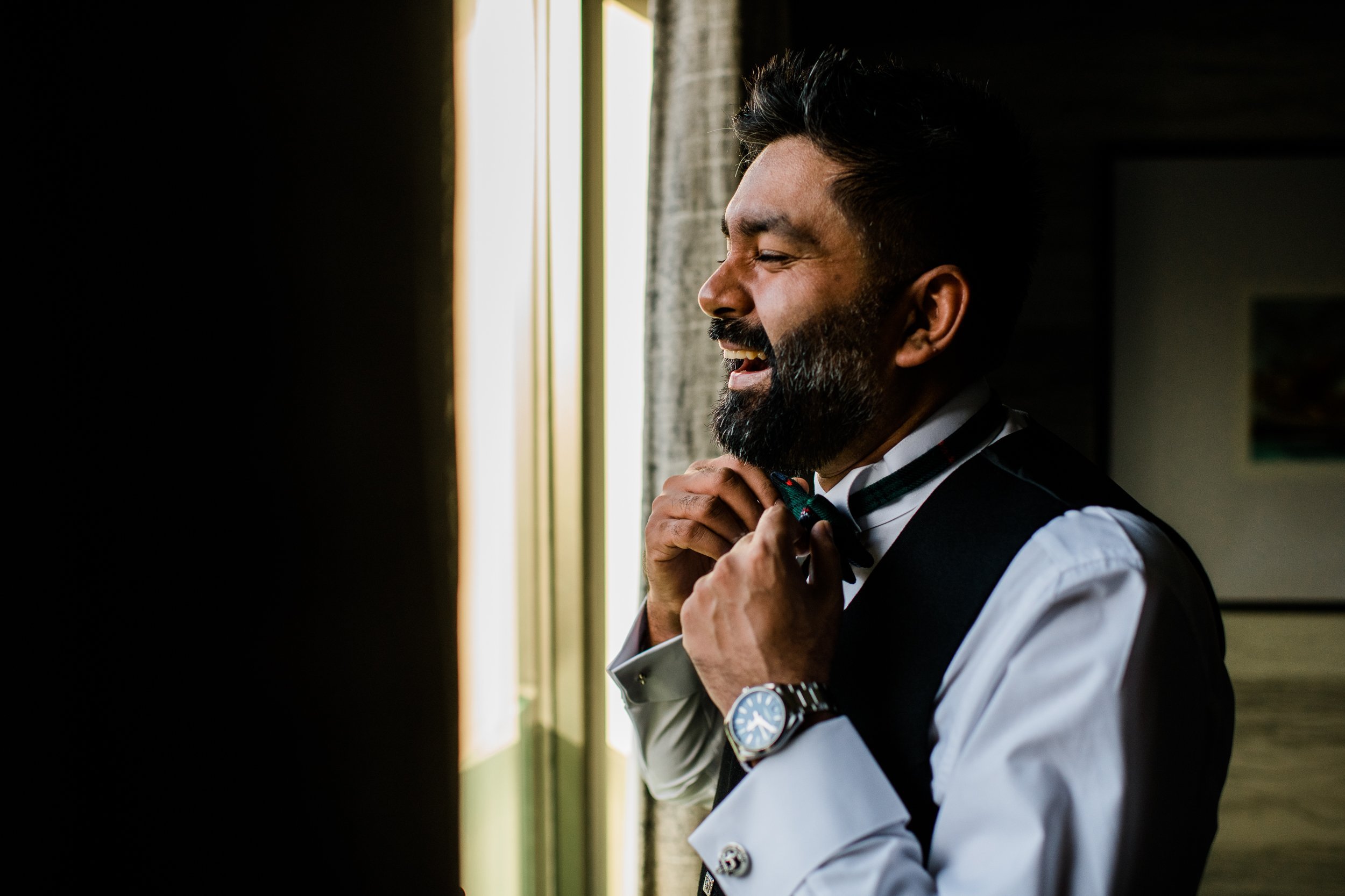 Groom getting ready at Cameron House