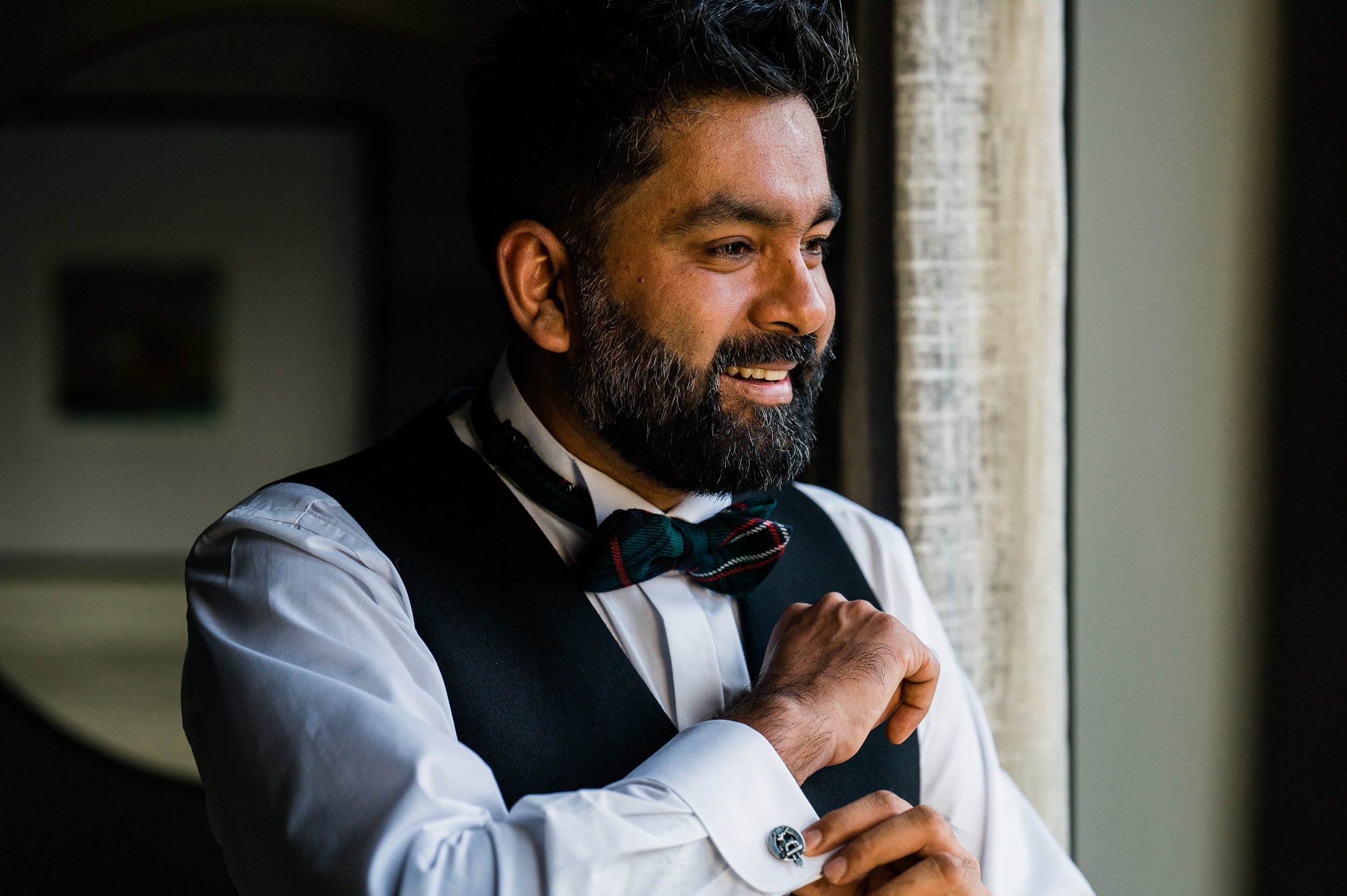 Groom getting ready at Cameron House