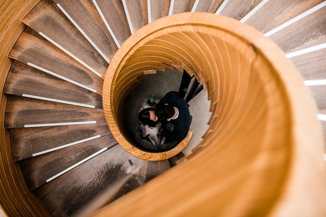 Spiral staircase wedding portrait