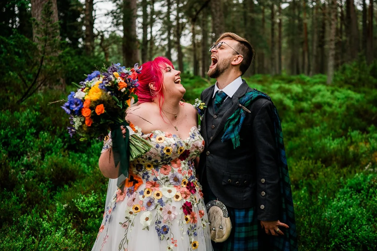 Bride-and-groom-laughing-in-the-woods-cairngorms-wedding
