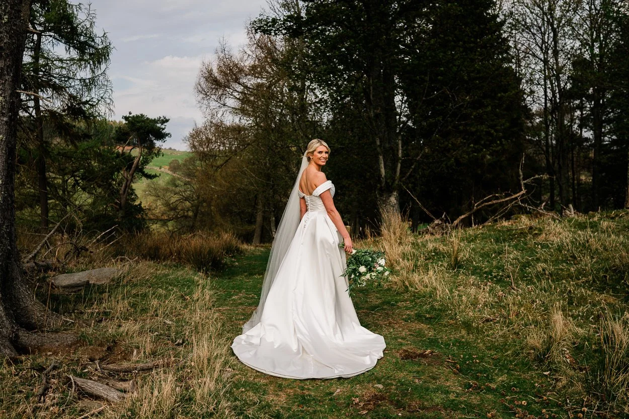 Bride portrait in woodland