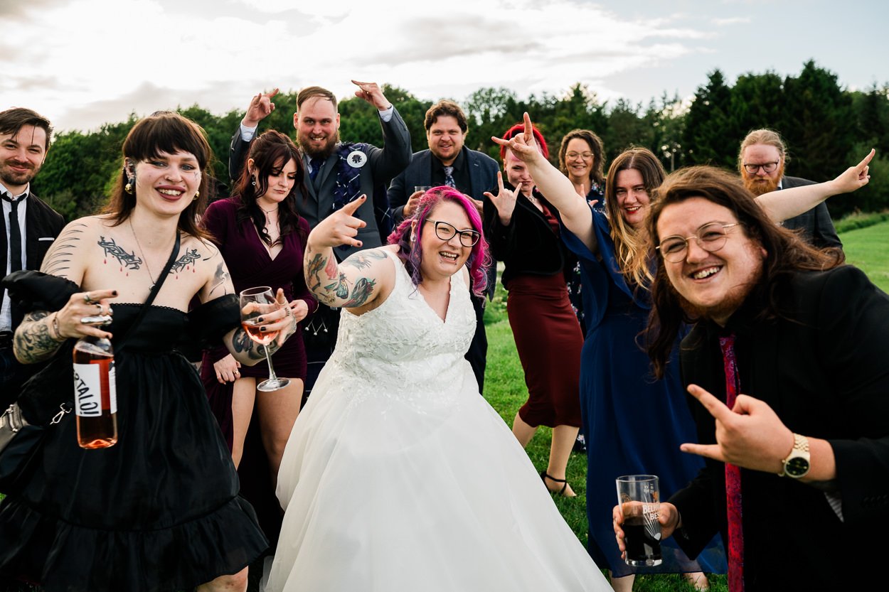 Bride and guests fun group shot