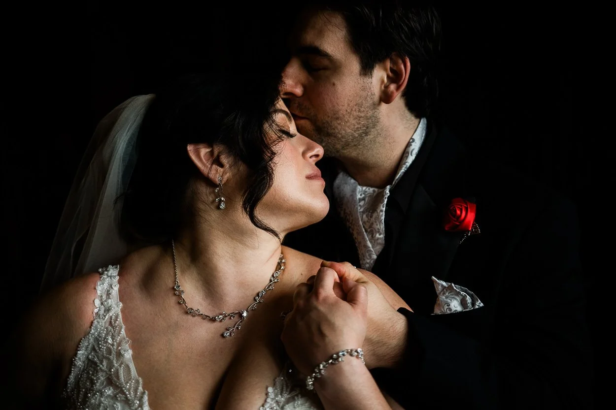 Powerful portrait of bride and groom in an Edinburgh castle