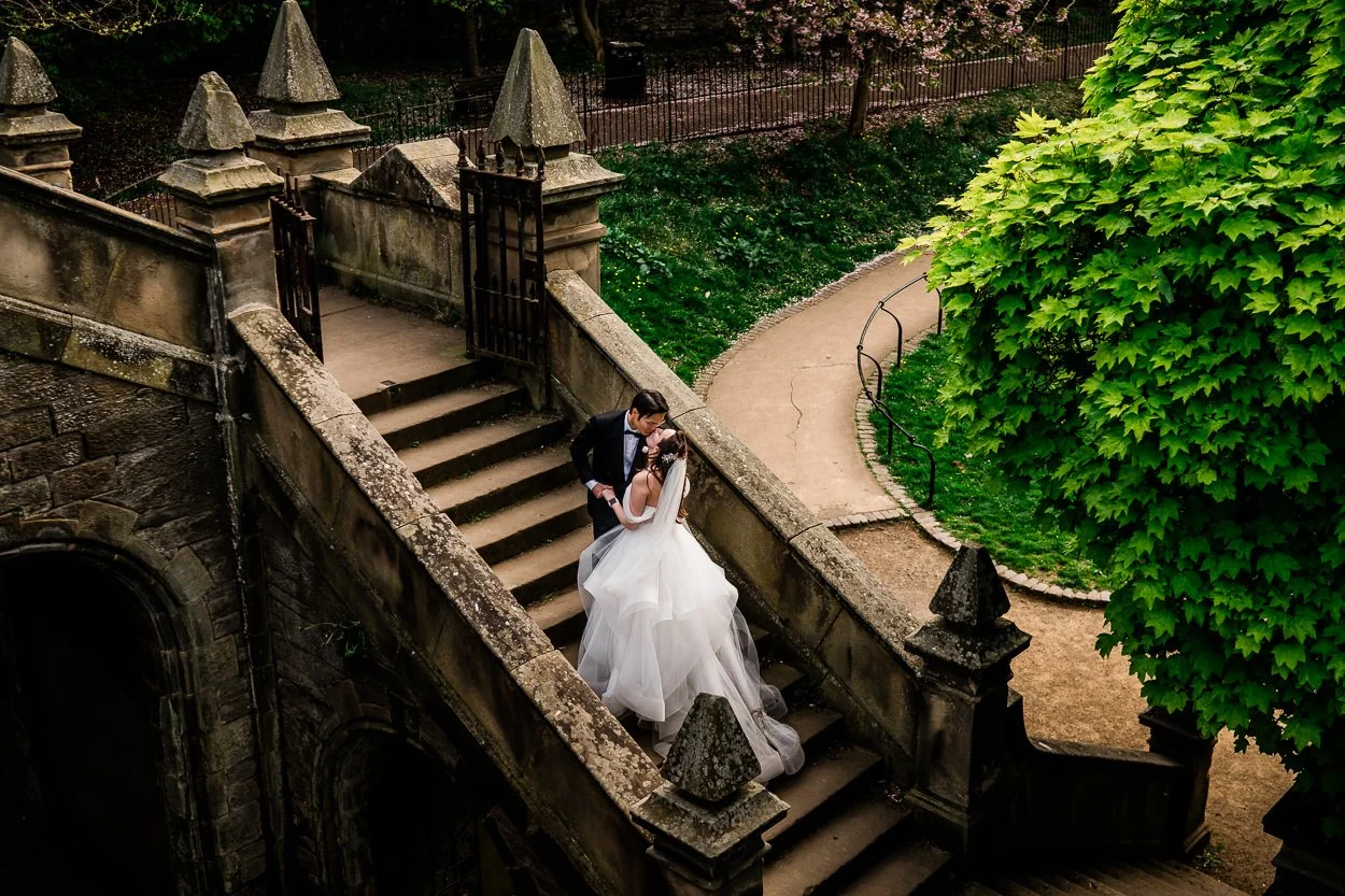 Bride-and-groom-on-ancient-bridge-edinburgh