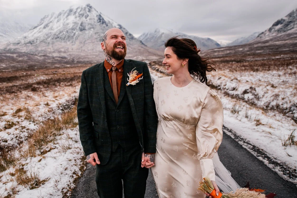 Bride-and-groom-laughing-in-the-snow-Glencoe-wedding
