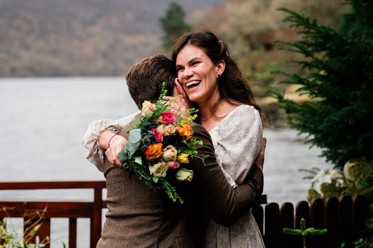 Brides joyful embrace of groom at first look