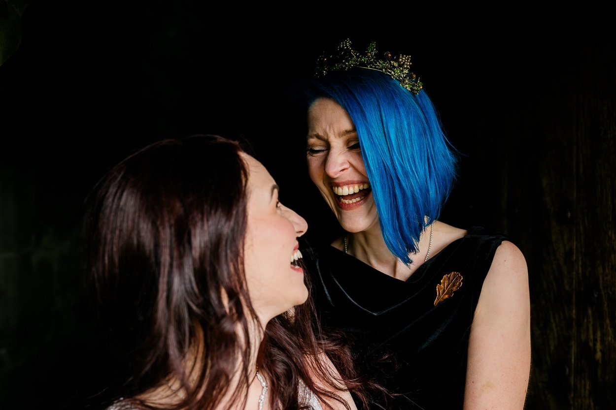 Two-brides-same-sex-wedding-laughing-kilmartin-castle