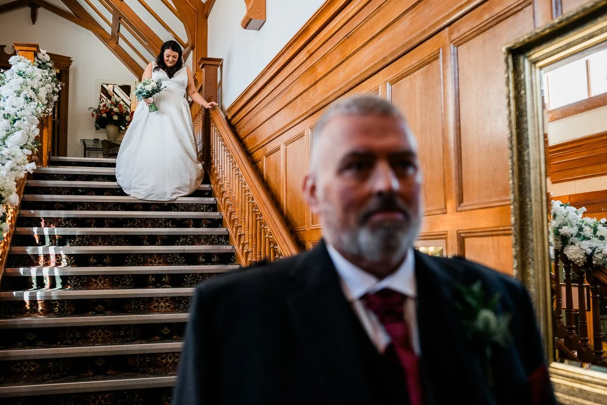 Bride approaching father for their first look