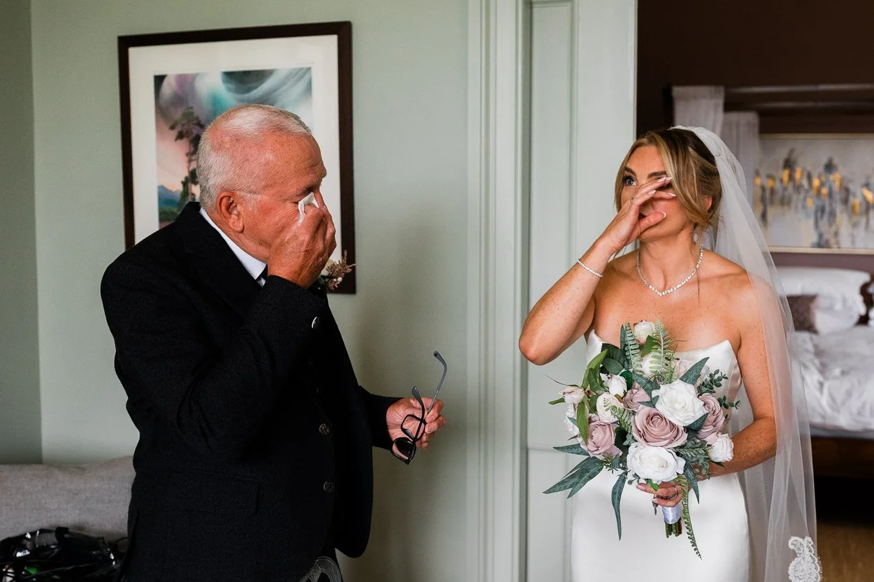 Bride-and-father-of-bride-crying-when-they-see-each-other-for-first-time