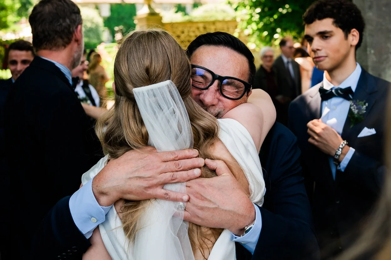 Emotional-hug-with-bride-Rosebery-Steading-wedding