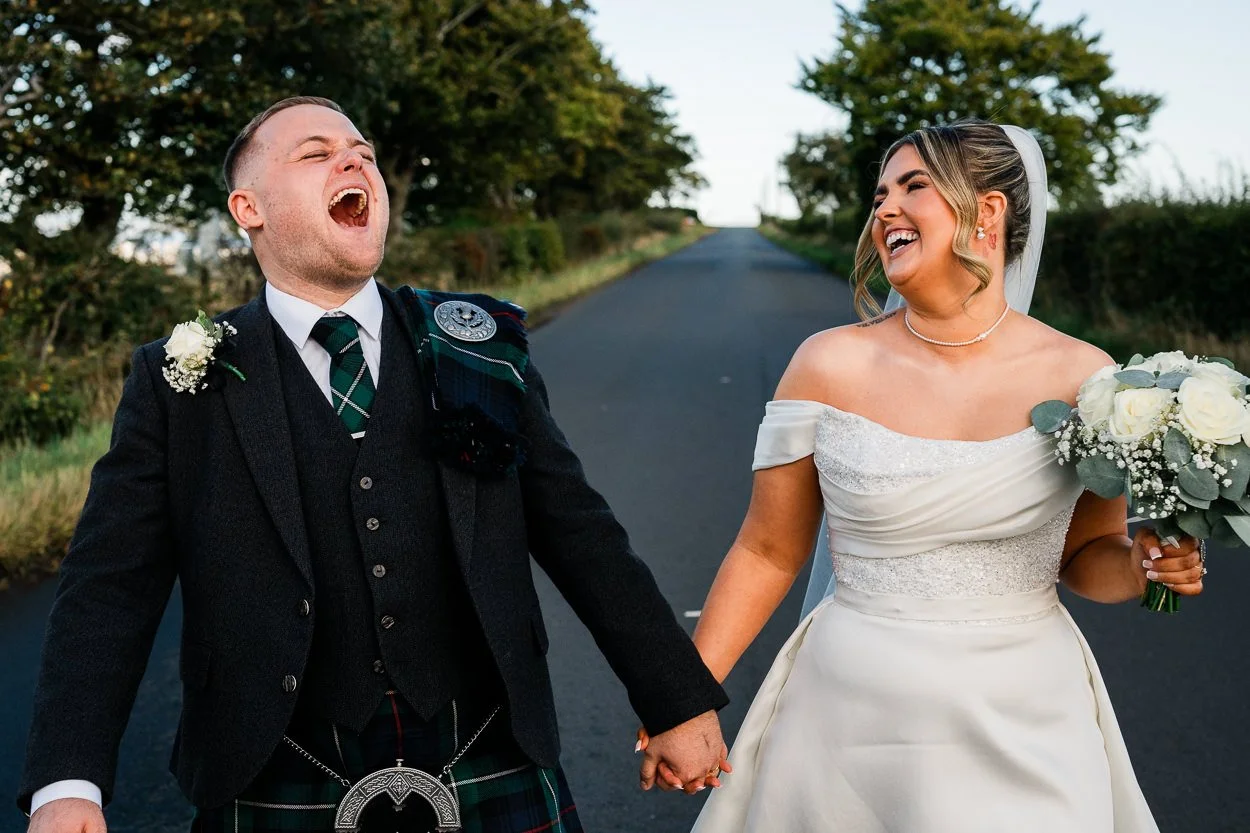 Bride-and-groom-screaming-with-laughter