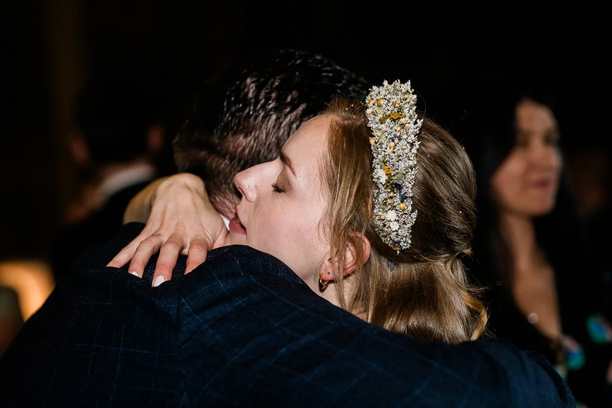 Candid hug by bride at Byre at Inchyra