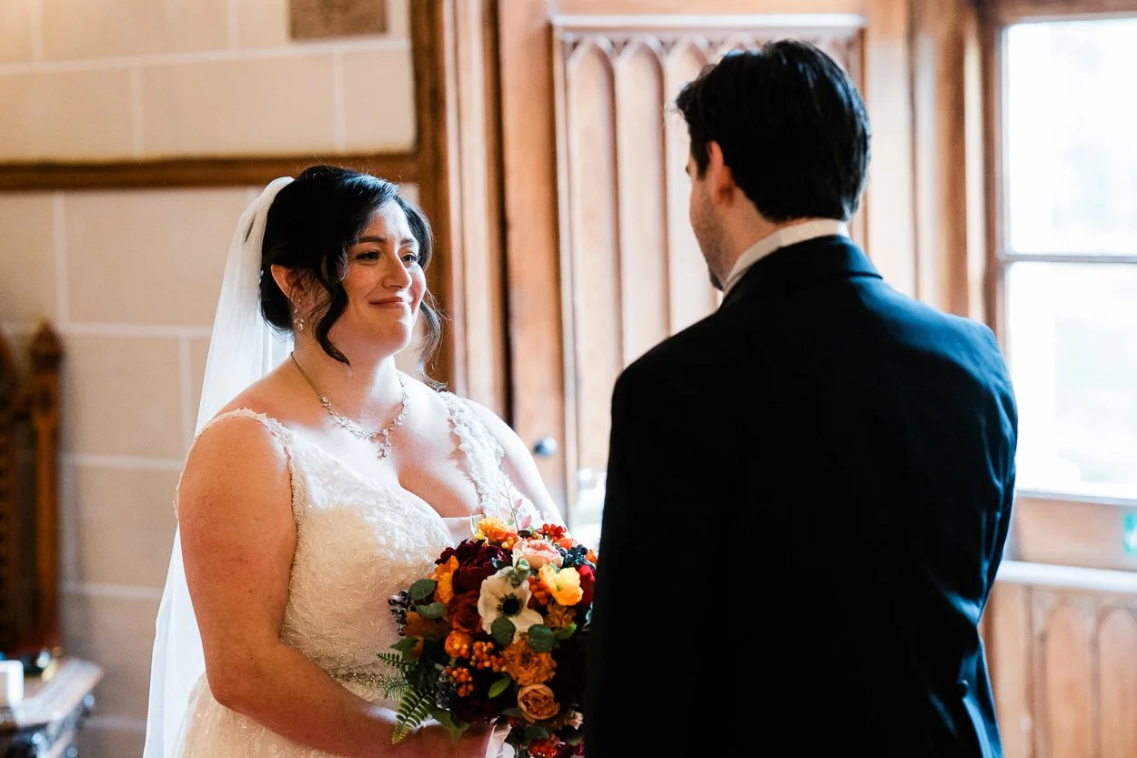 Bride laughing during ceremony