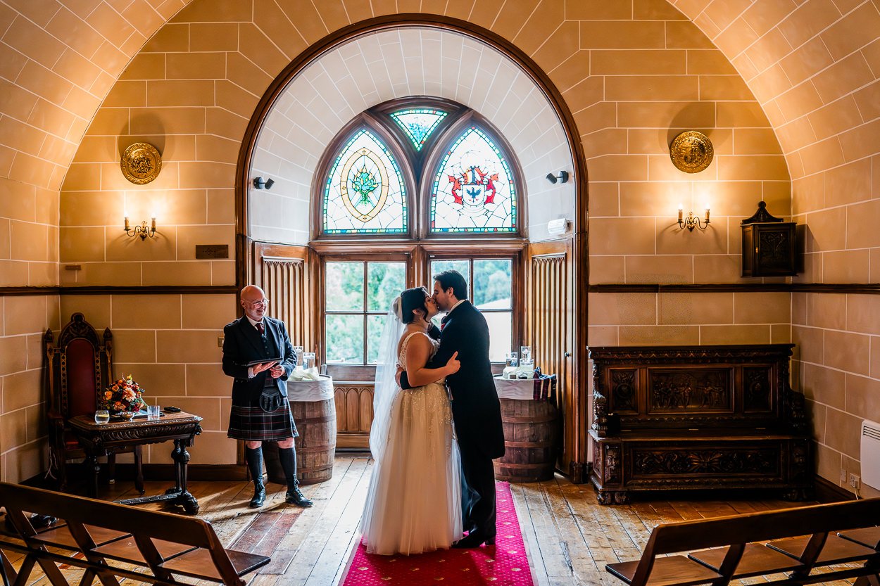 First kiss at Dalhousie Castle chapel ceremony