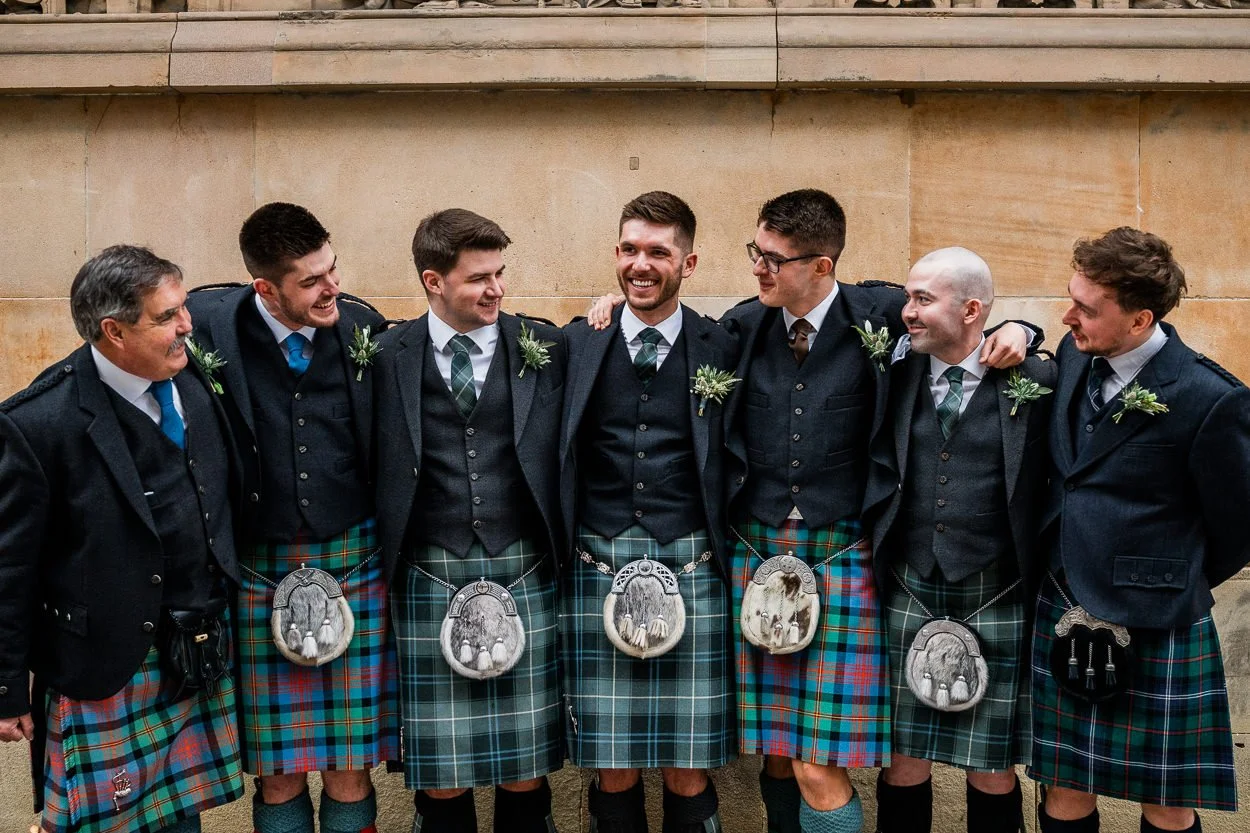 Groomsmen laughing outside citation Glasgow
