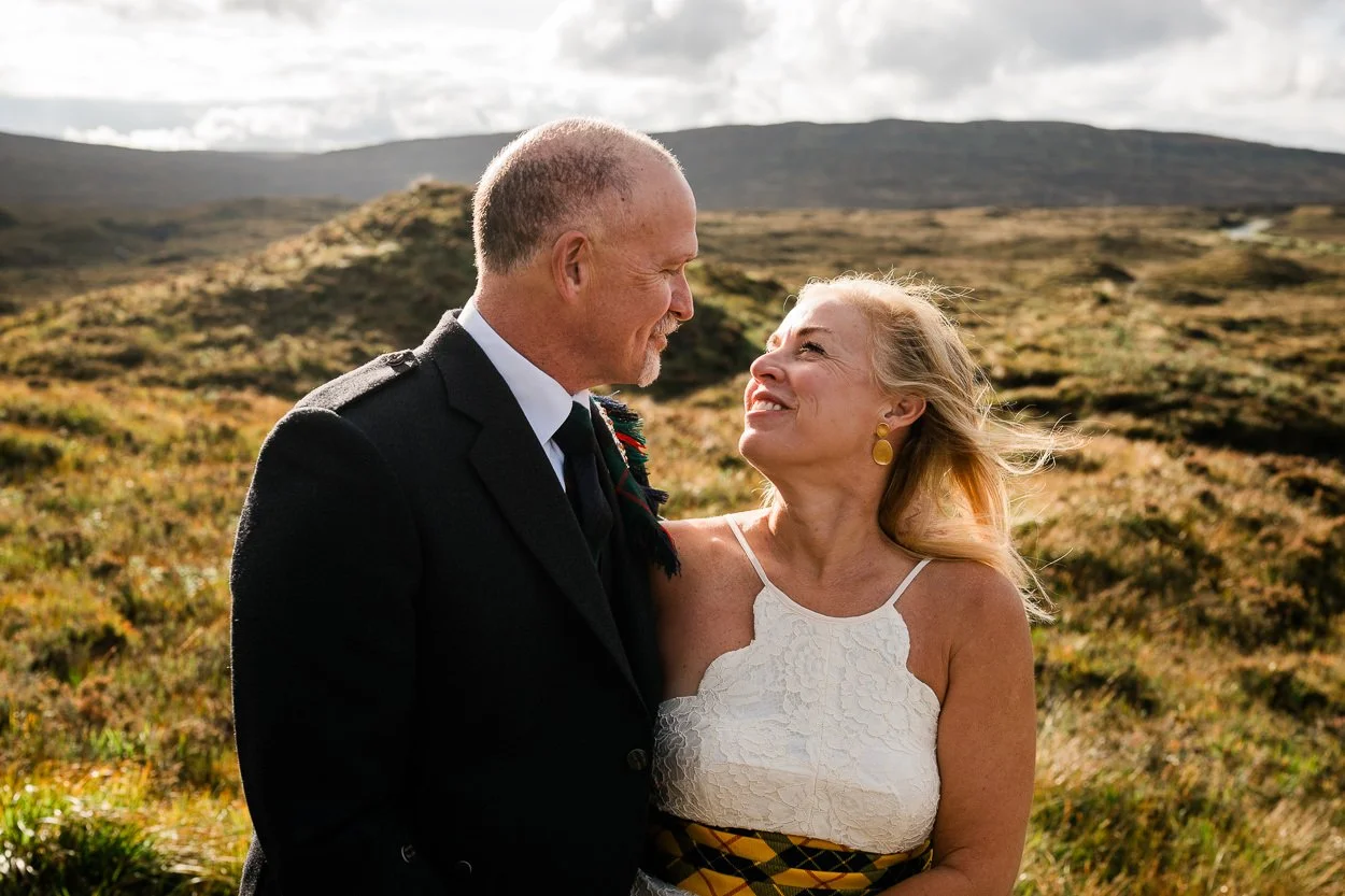 Emotional and fun portrait of bride and groom