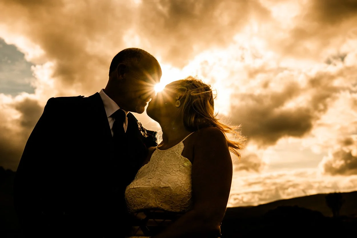 Bride and Groom Silhouette with Cullin Mountains, Skye in background
