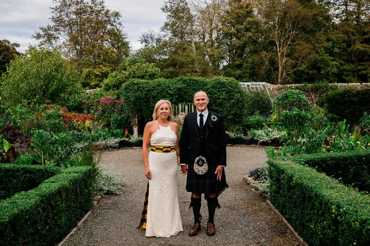 Bride and groom portrait - Dunvegan Castle walled garden