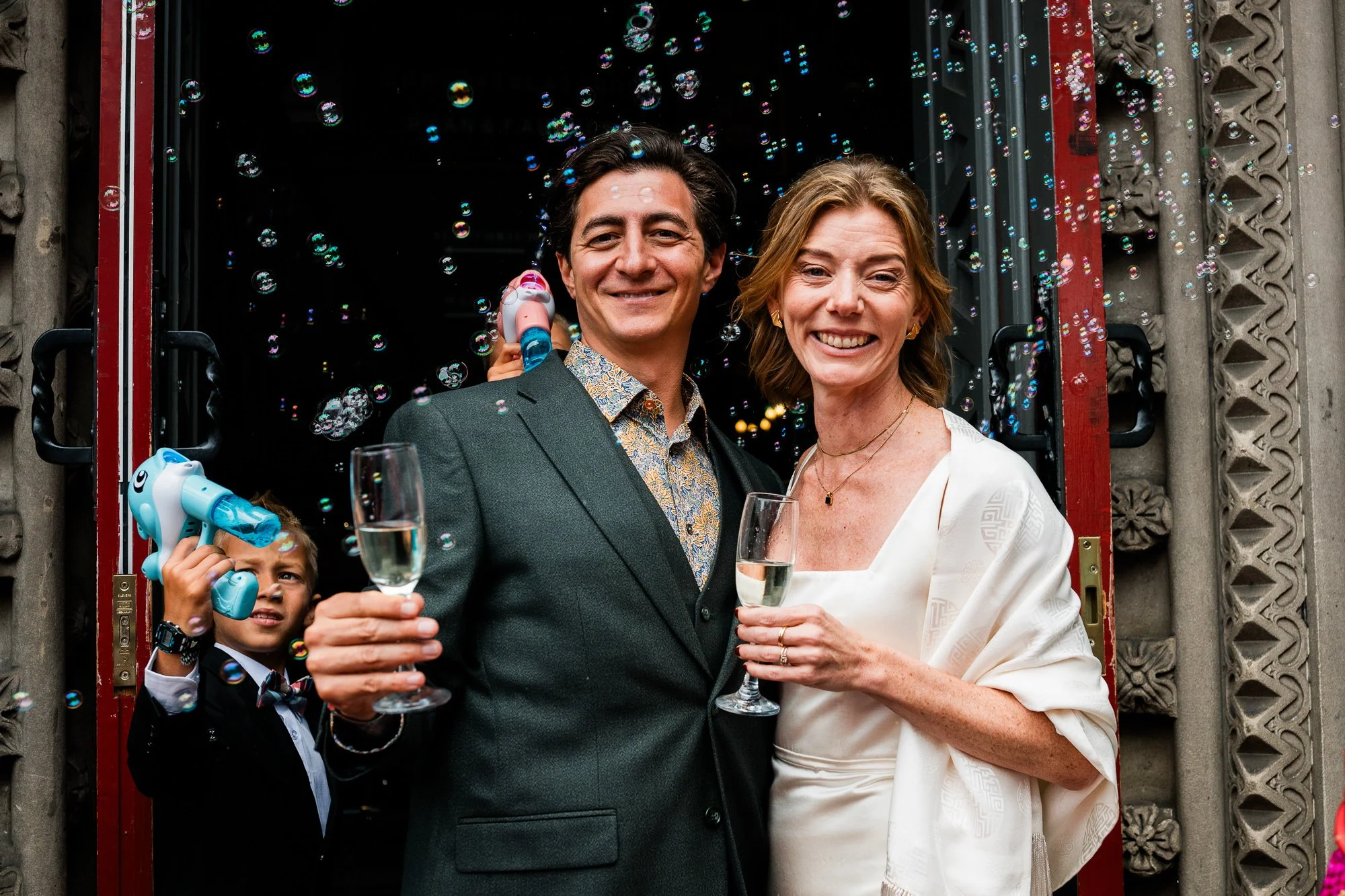 Bride and groom surrounded by bubbles at Ghillie Dhu Edinburgh