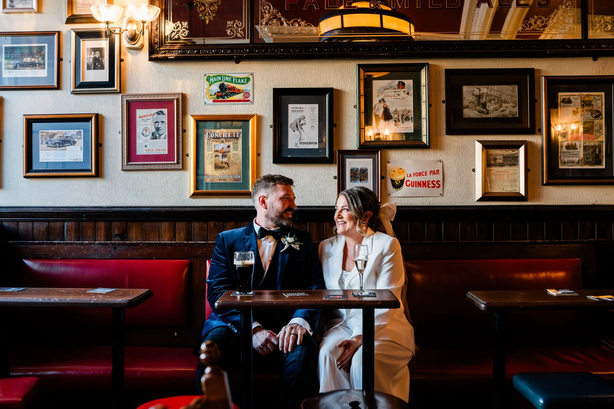 Bride and Groom sitting in an Edinburgh bar having a pint