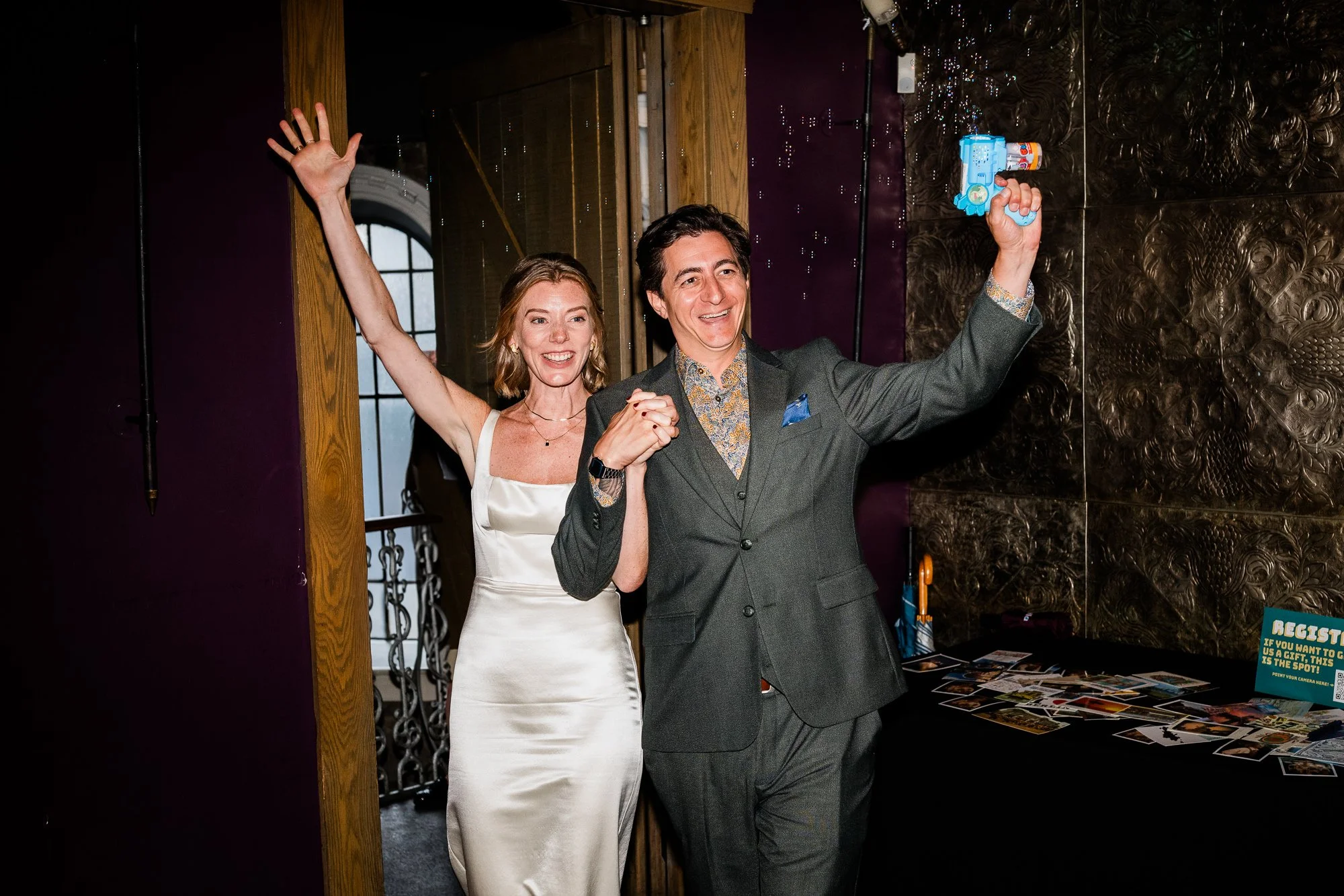 Bride and groom entering wedding reception at Ghillie Dhu Edinburgh