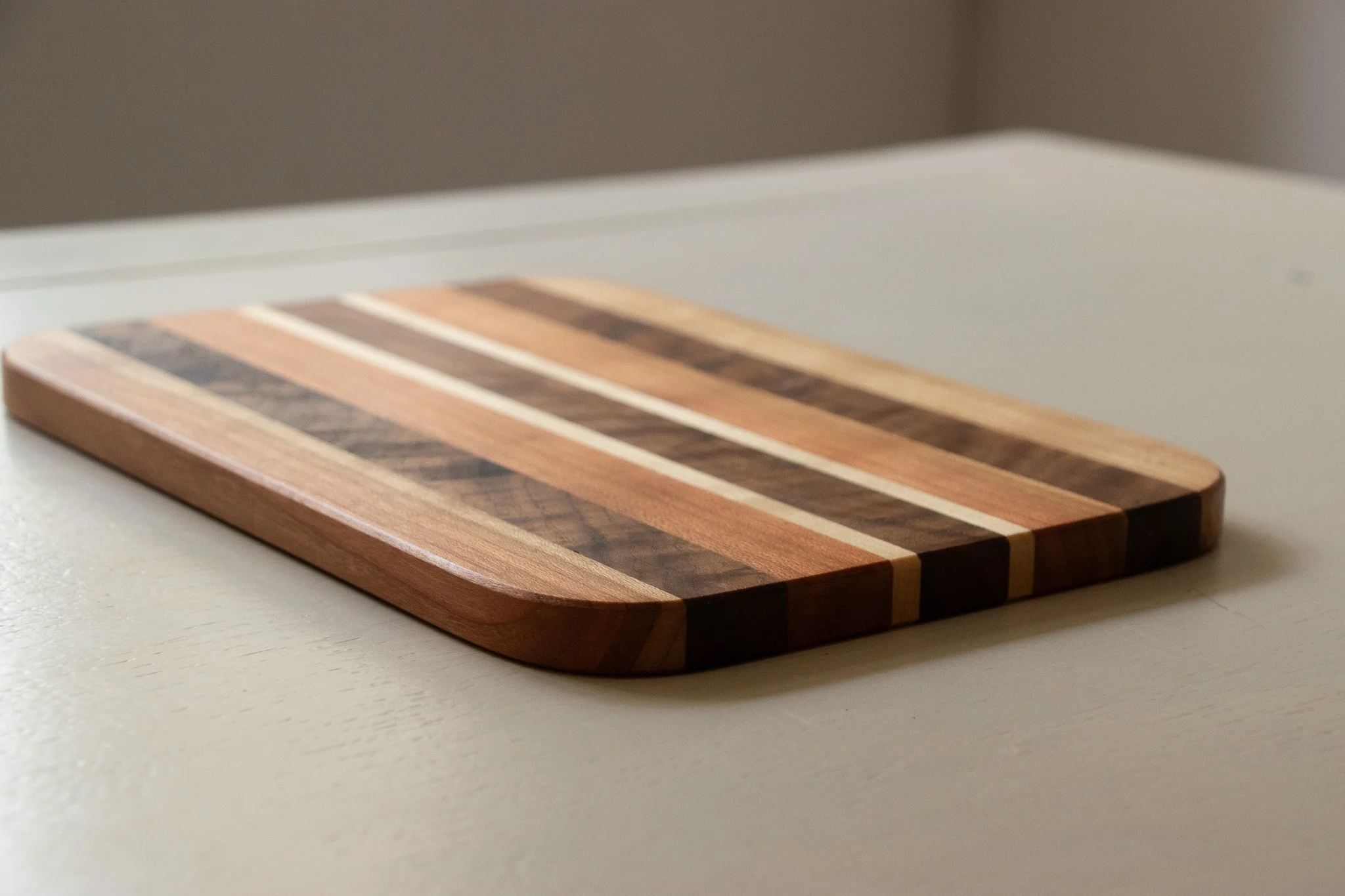 Small Hand Made Cherry, American Black Walnut and Maple Chopping Board