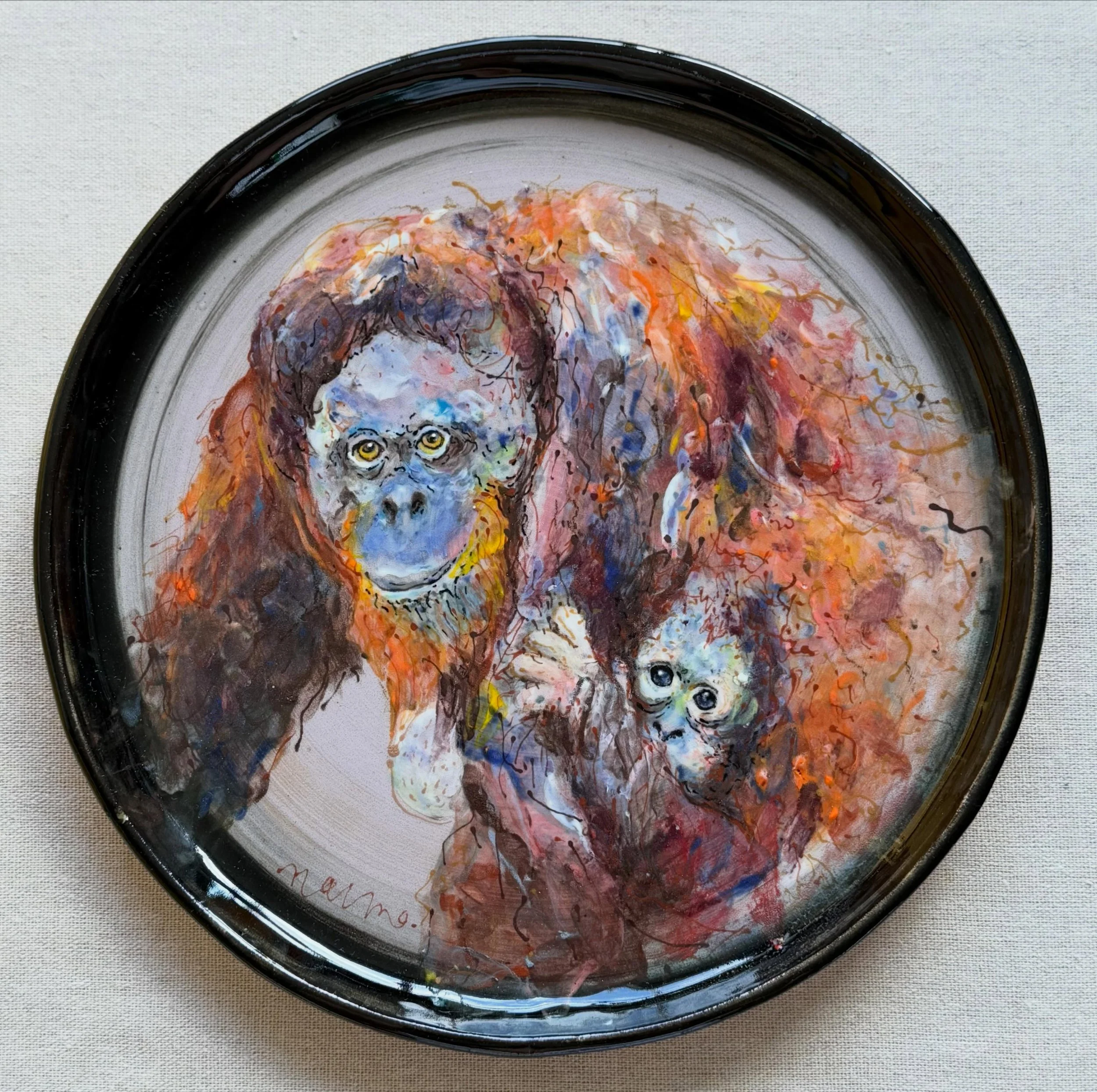 orangutan mom and baby plate! 🤎🧡🩷

#plates
#painting 
#pottery