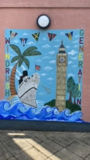 Haringey Learning Partnership, London. Windrush mosaic and painted mural. Students were supported to create mosaic sections with Donna & Sally Kendall.