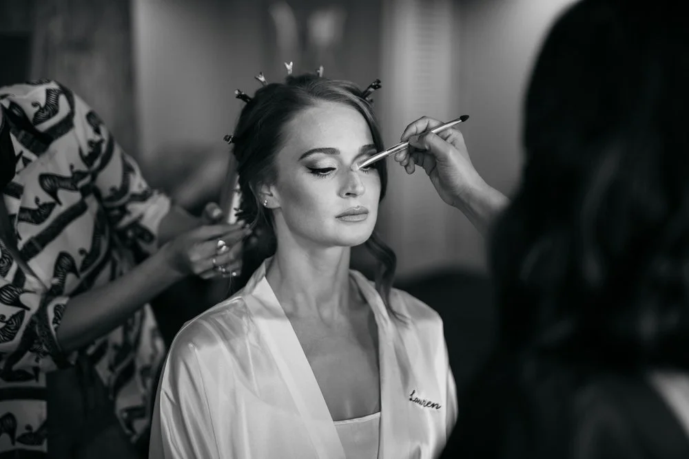 Bride getting hair and makeup done at Château de Martinay in Provence, capturing luxury wedding styling and beauty services for refined events in the South of France.