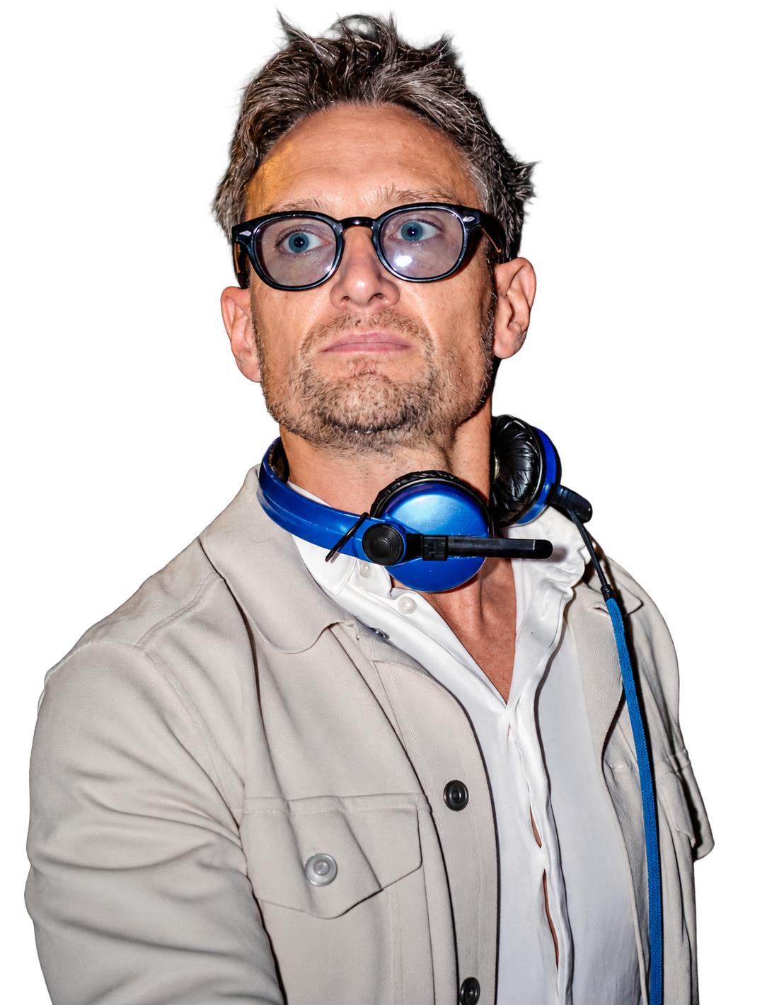 Portrait of DJ Ollie, Monaco-based international DJ, wearing blue headphones and a light jacket, represented by Parasol Entertainment on the French Riviera.