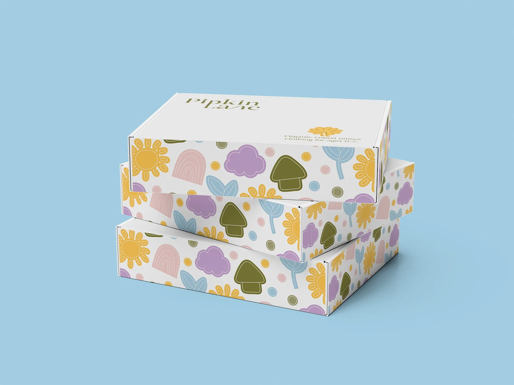 Three white cardboard boxes with colorful floral and mushroom patterns stacked on a light blue background.