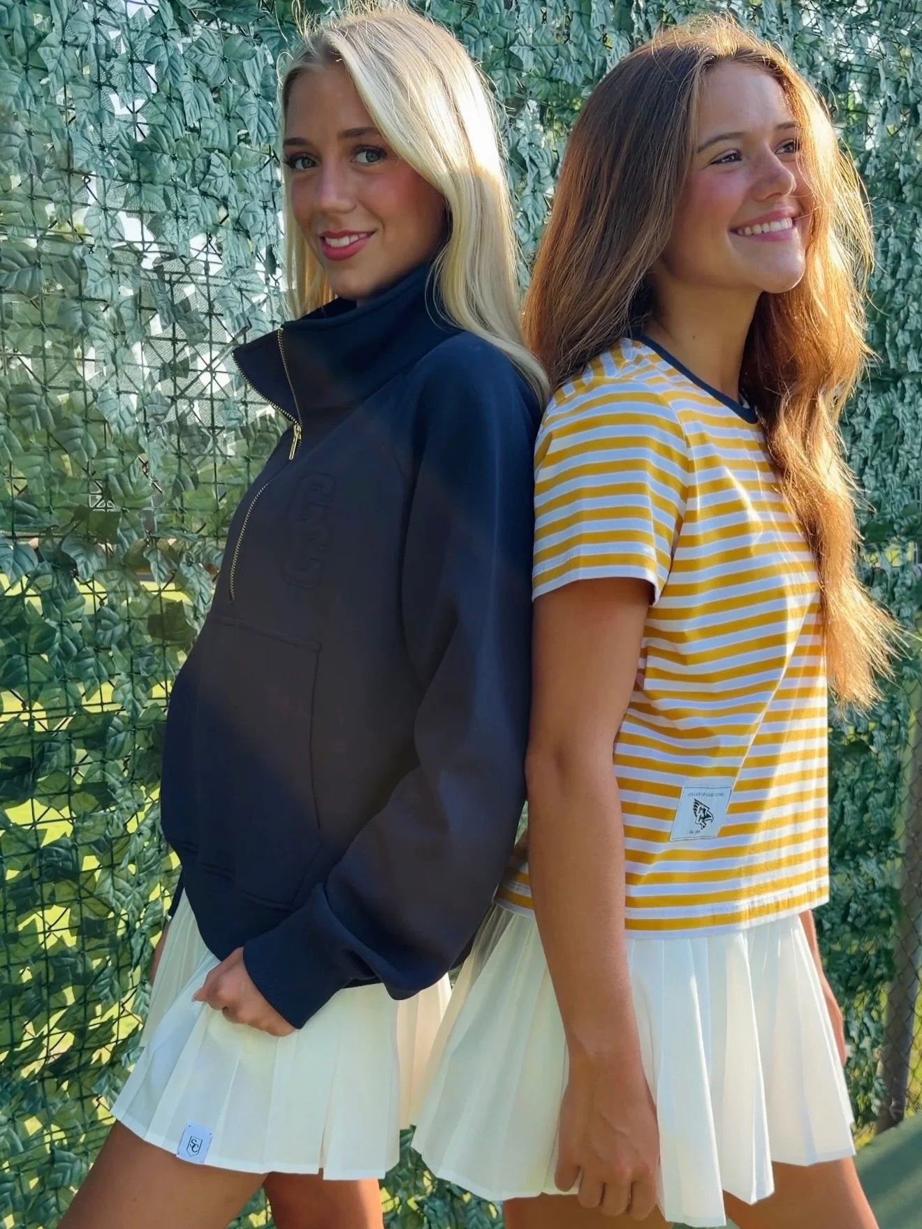 Our Lady of Good Counsel is ready for all things fall in their Varsity Ringer Tees and School Spirit Half Zips. 📣 Go Falcons