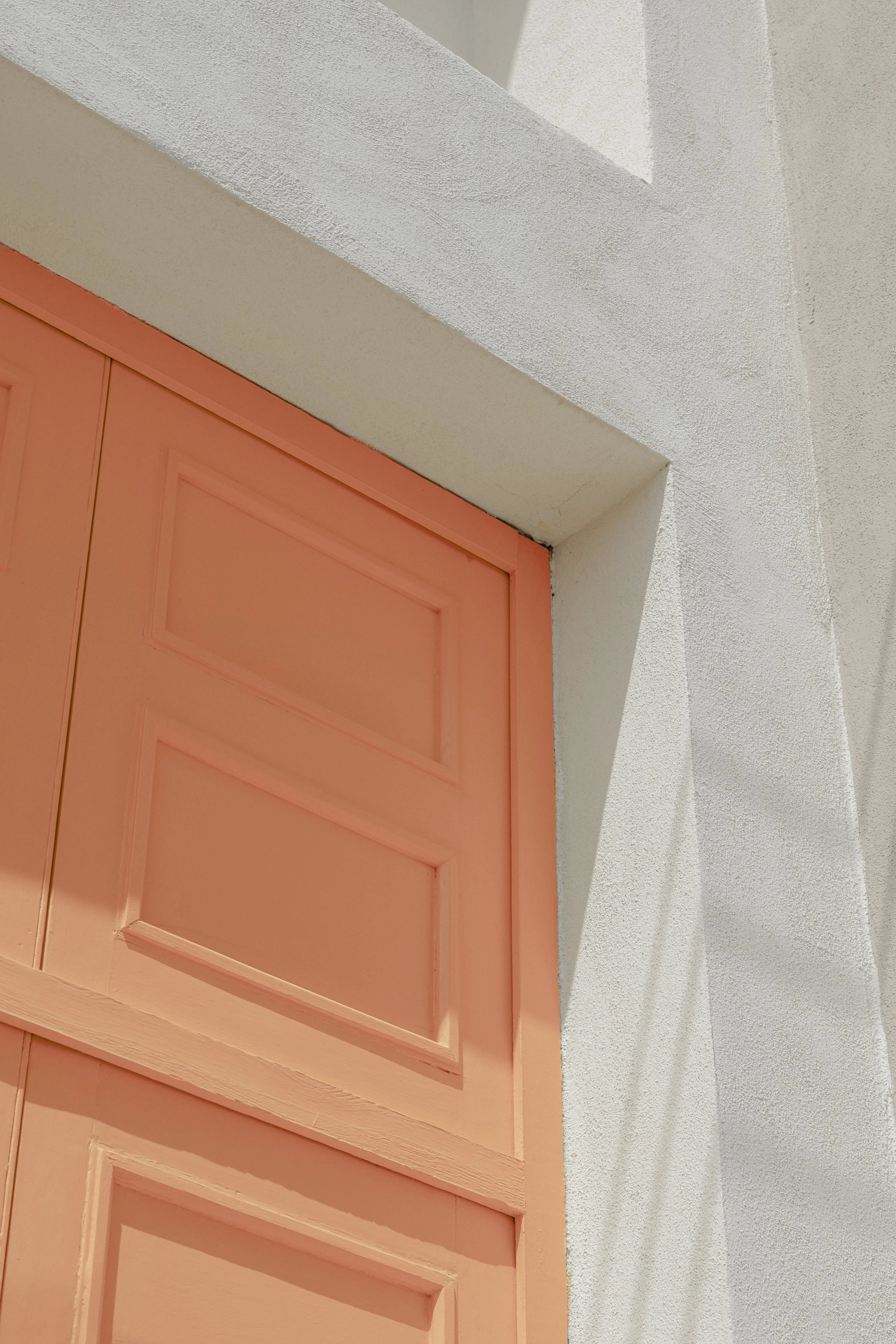 orange door in shadows