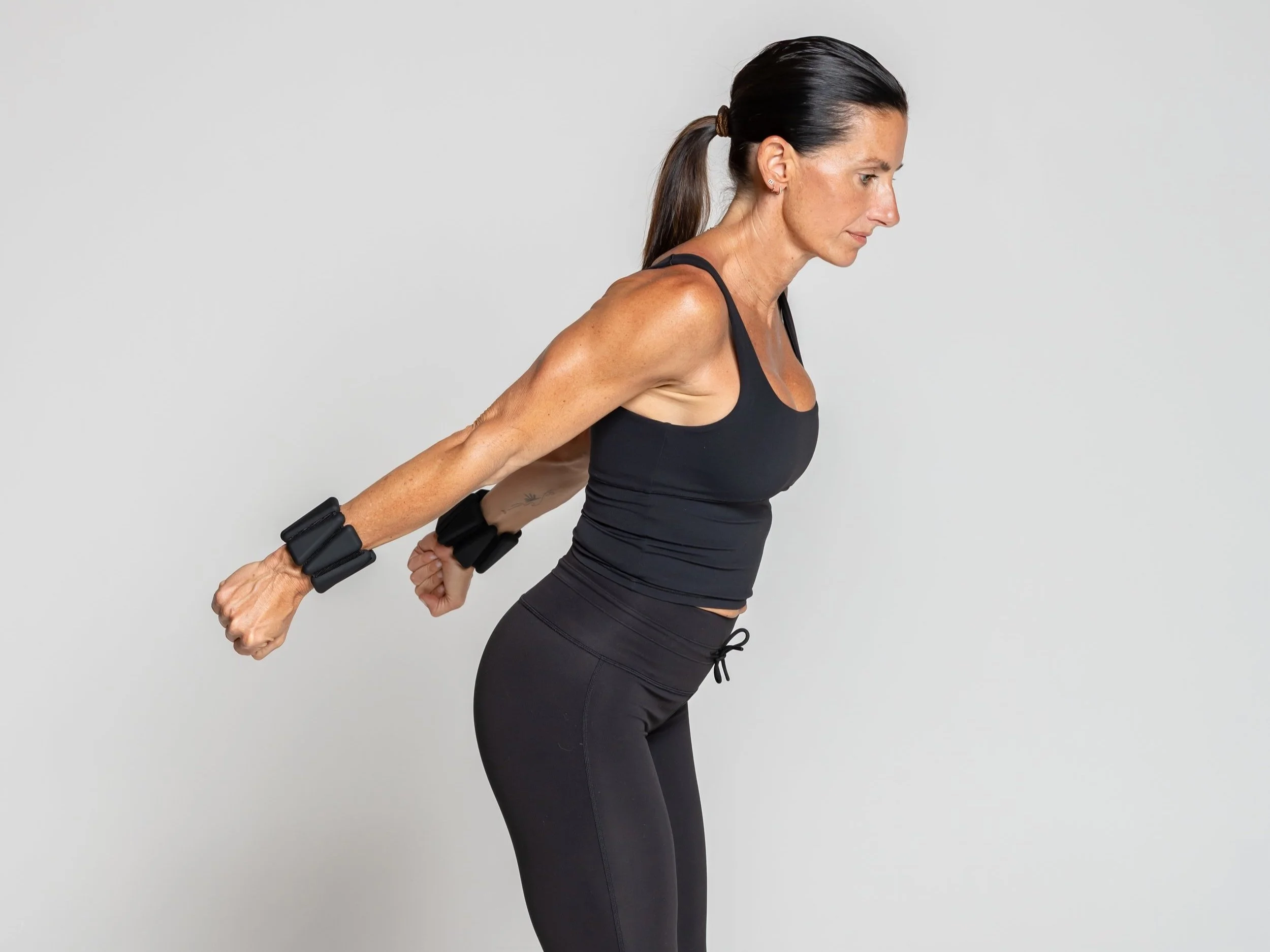 Tricep Kickback - Slight fold forward, elbows stay tight by side, kickback bent elbow to straight.