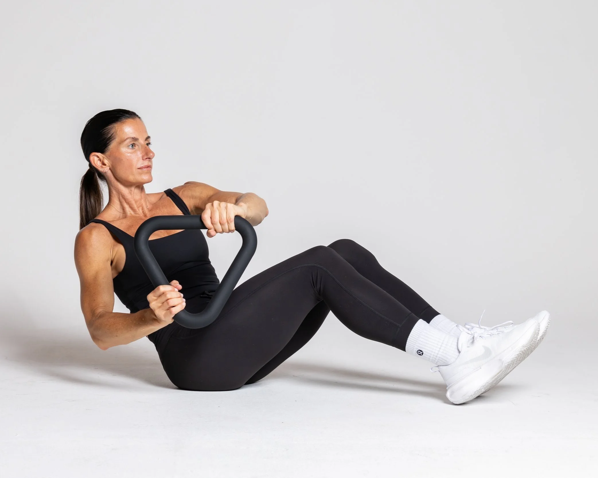 Twists- seated, hinge slight back, engage core, hold still and rotate triangle from side to side, touching the floor with the tri.