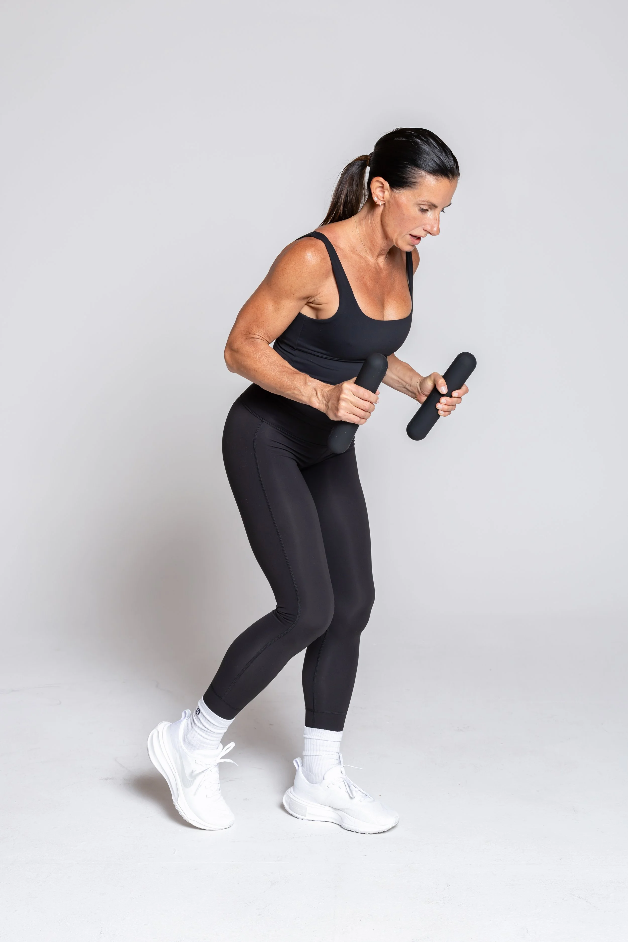 Tricep Kickback – Elbows up, extend arms straight back to hit your triceps.