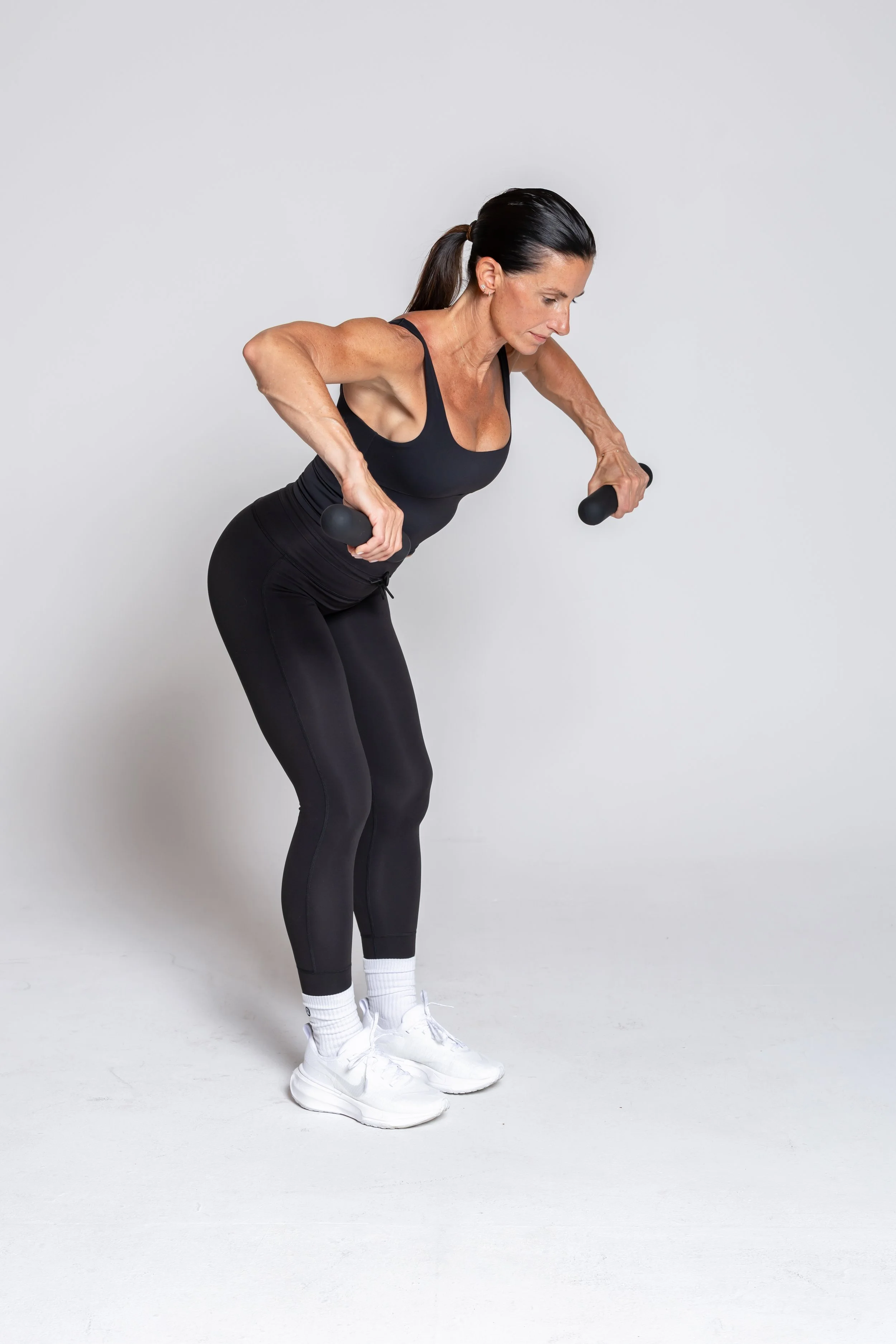 Bent-Over Rear Delt Fly – Hinge at the hips, fly arms out wide, and control the return.