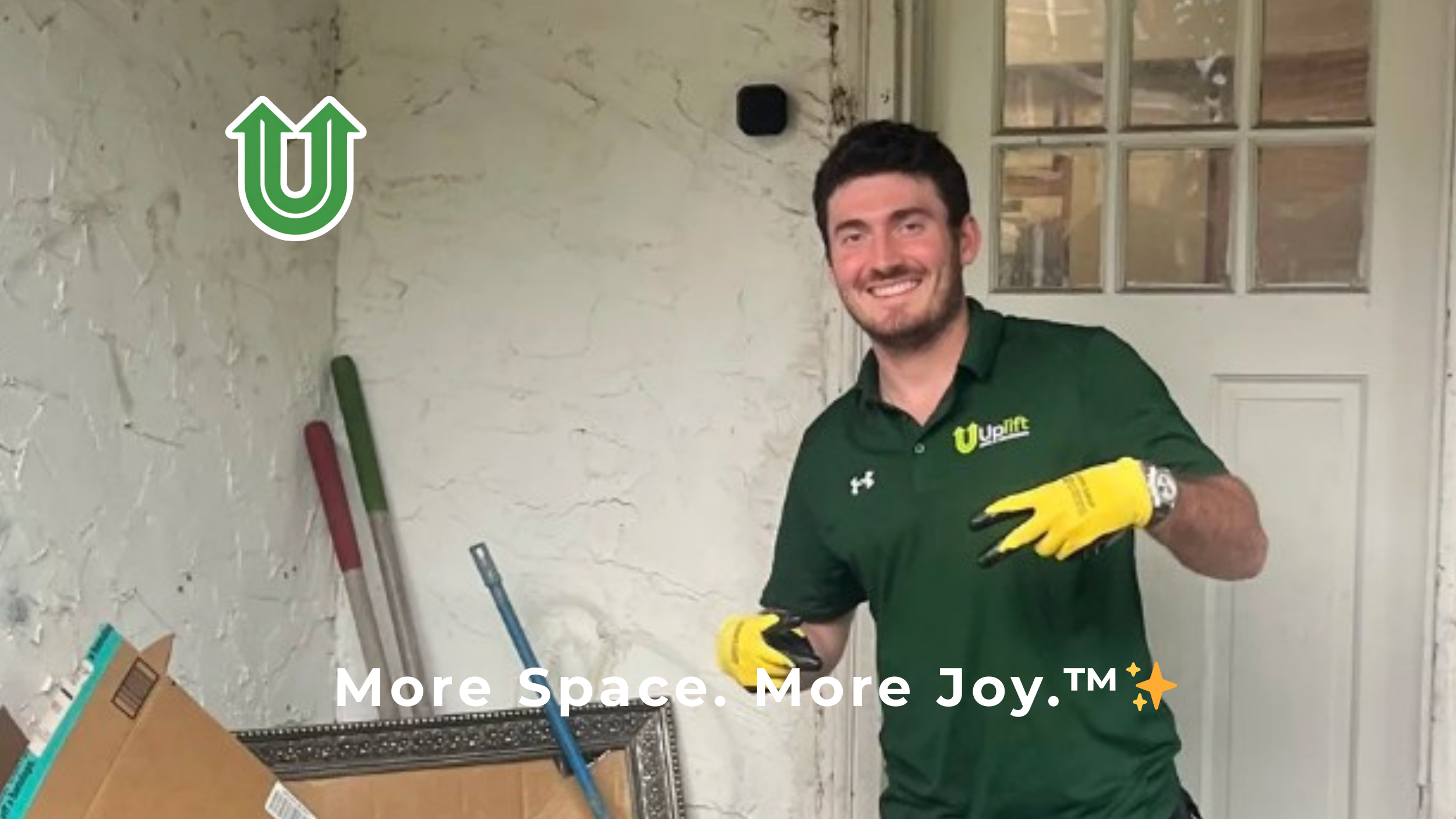 Branded photo from Uplift Junk Solutions showing Richard giving a peace sign after a successful junk removal job on a Philly porch. The image features the green Uplift “U” brand mark and the ‘More Space. More Joy.™ ✨’ tagline.
