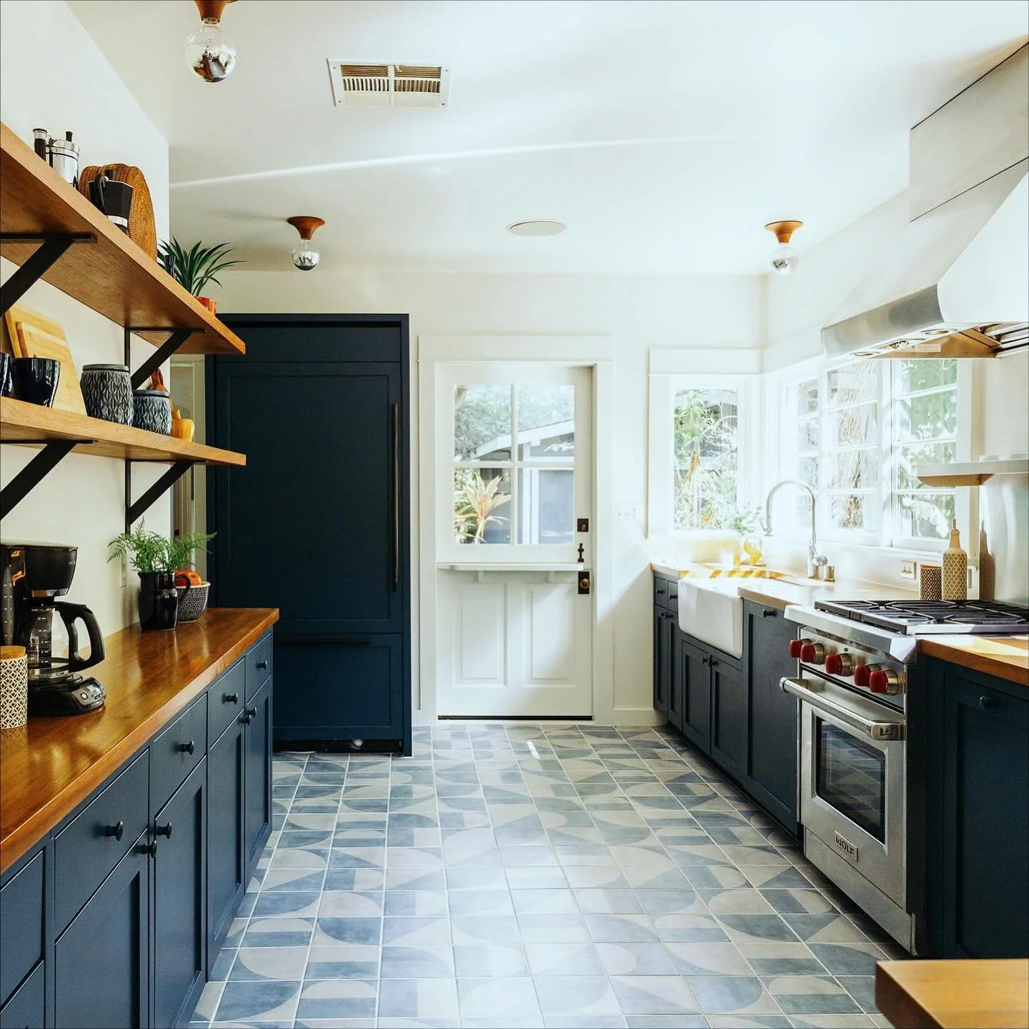 💙 The Blue House with the Blue Kitchen 💙
My favorite realtor (the fabulous @lexinewman) needed help reviving this tired kitchen prior to sale. 
The bright blue cabinets didn’t make any sense with the harsh black floor. It was such a special