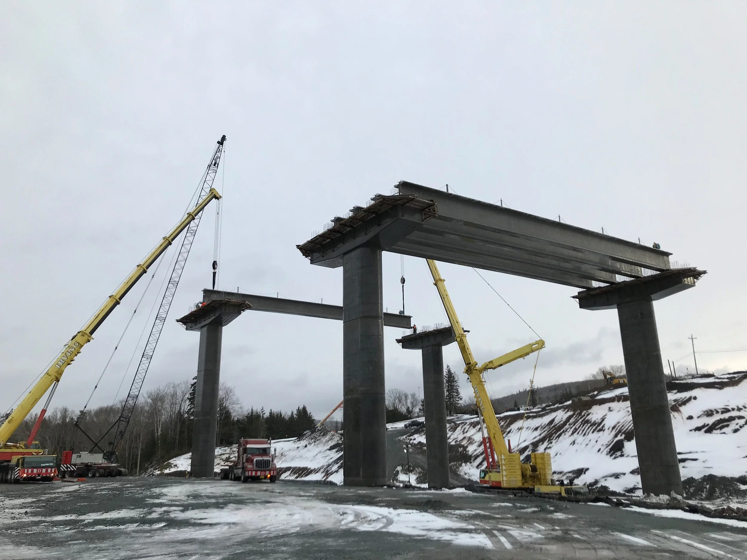 The Middle Brook Bridge, part of the Highway 104 twinning, under Construction. Girders are being erected on the piers and supports.