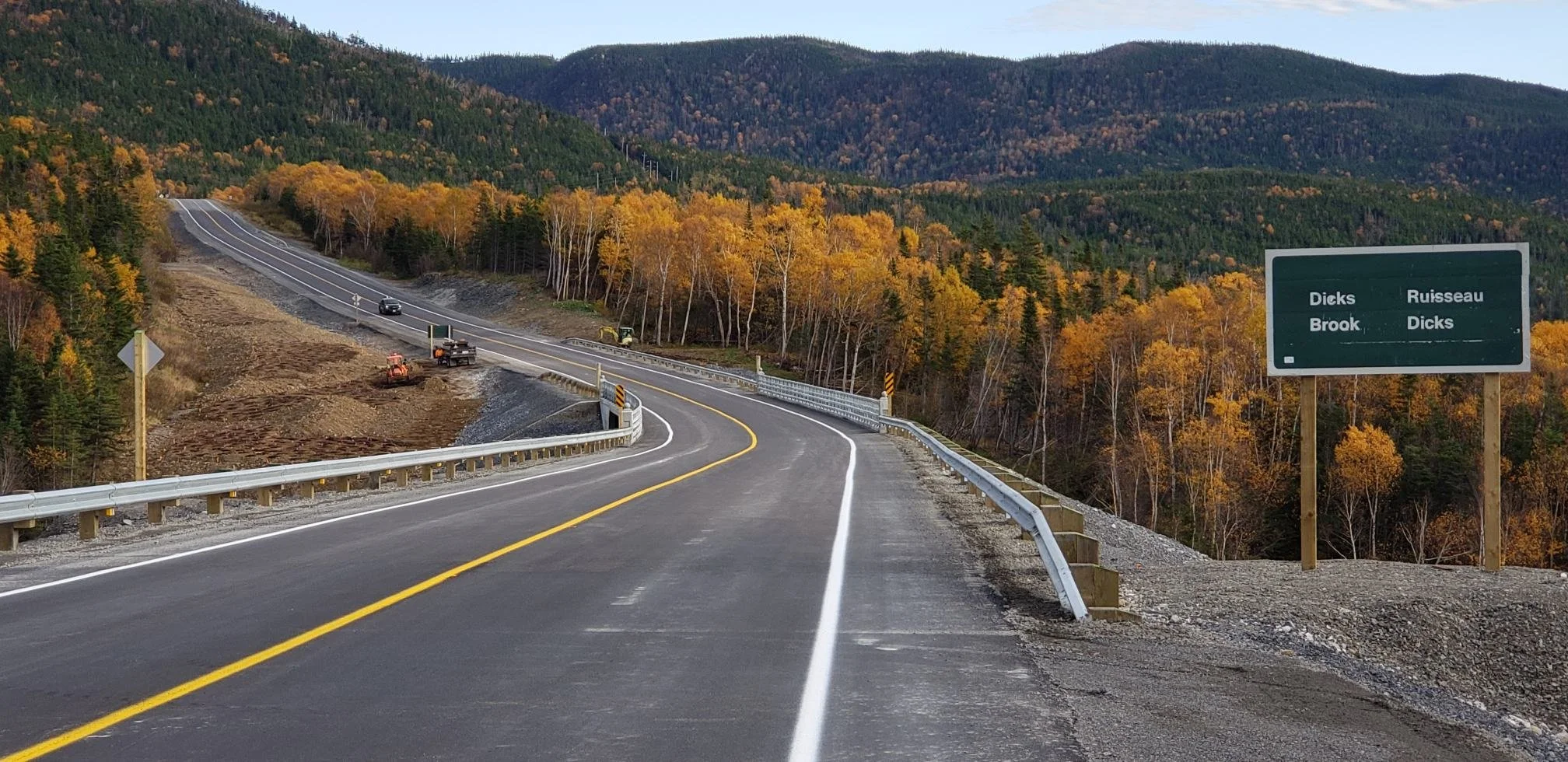 The freshly paved and painted roadway of the newly constructed Dick's Brook Bridge. Once can see the leaves have begun to change colour on this scenic drive.